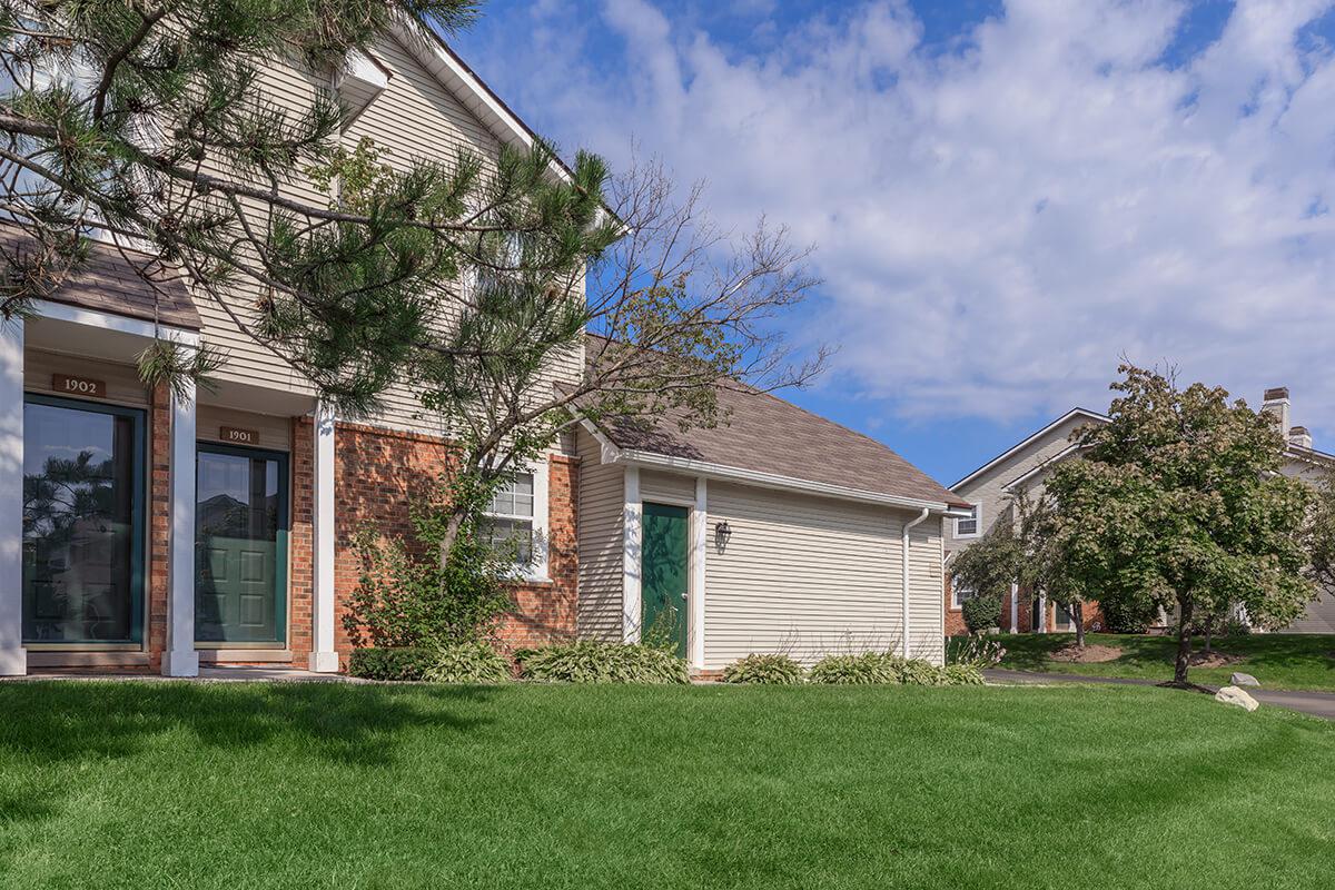 a large lawn in front of a house