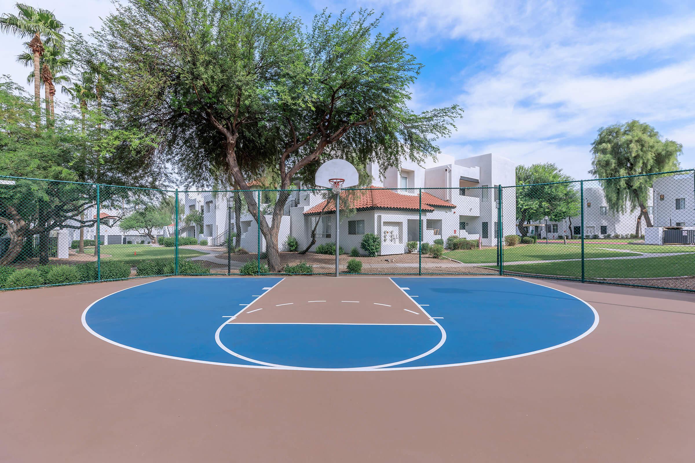 a pool next to a basketball court