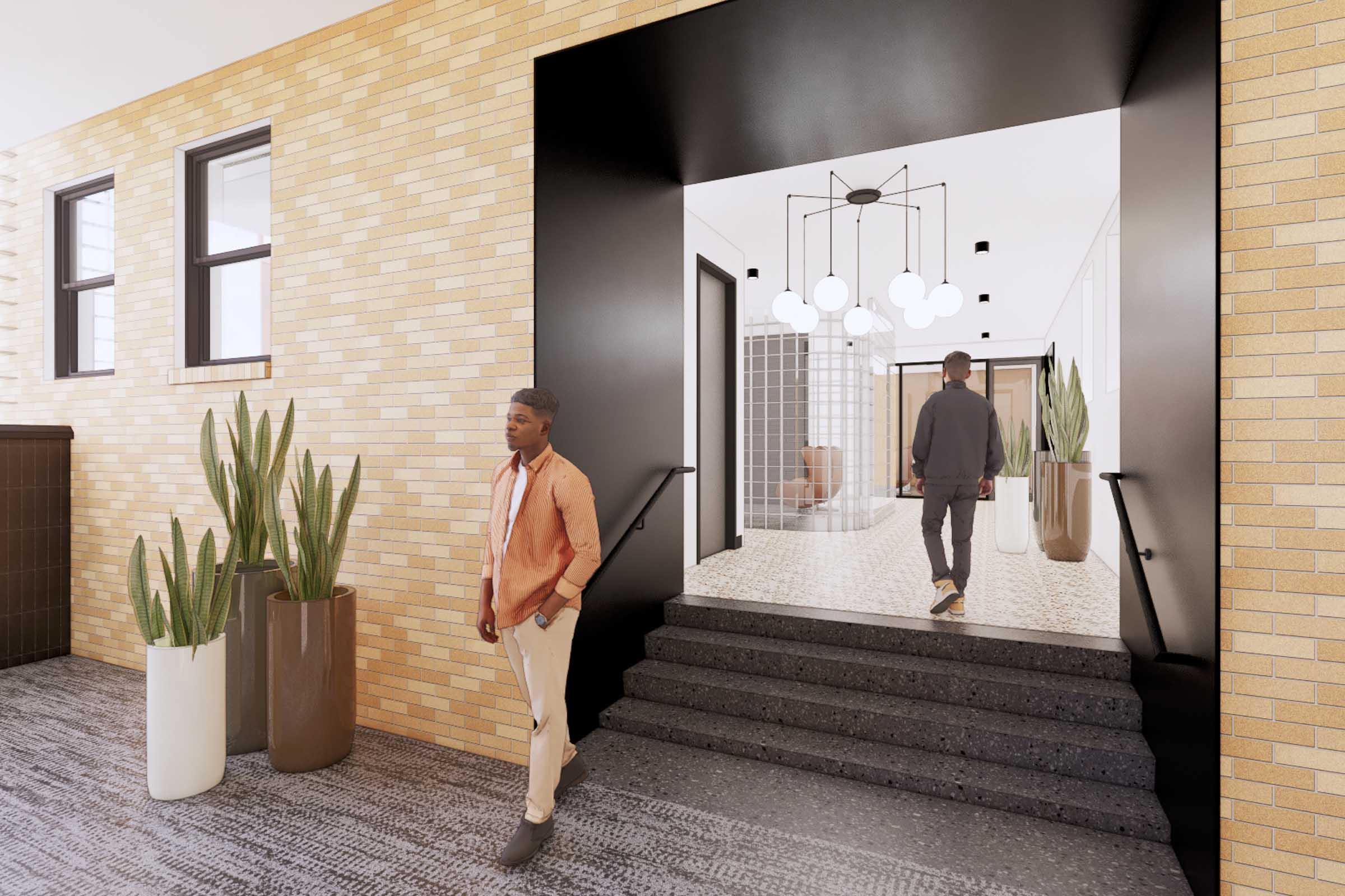 A modern interior entrance featuring two men walking through a hallway. One man is dressed in a light orange shirt and beige pants, while the other wears a dark outfit. The space includes large potted plants, stylish lighting fixtures, and a contemporary design with textured walls and patterned flooring.