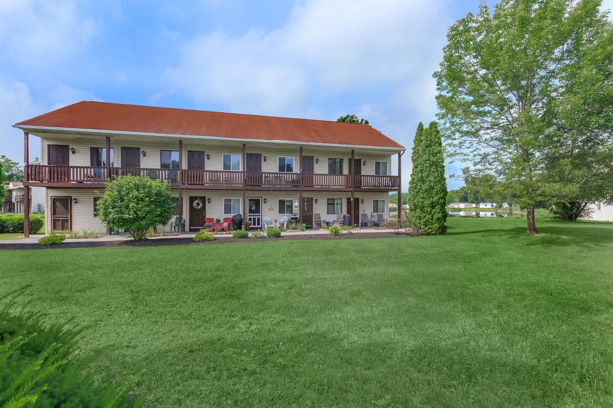 a large lawn in front of a house