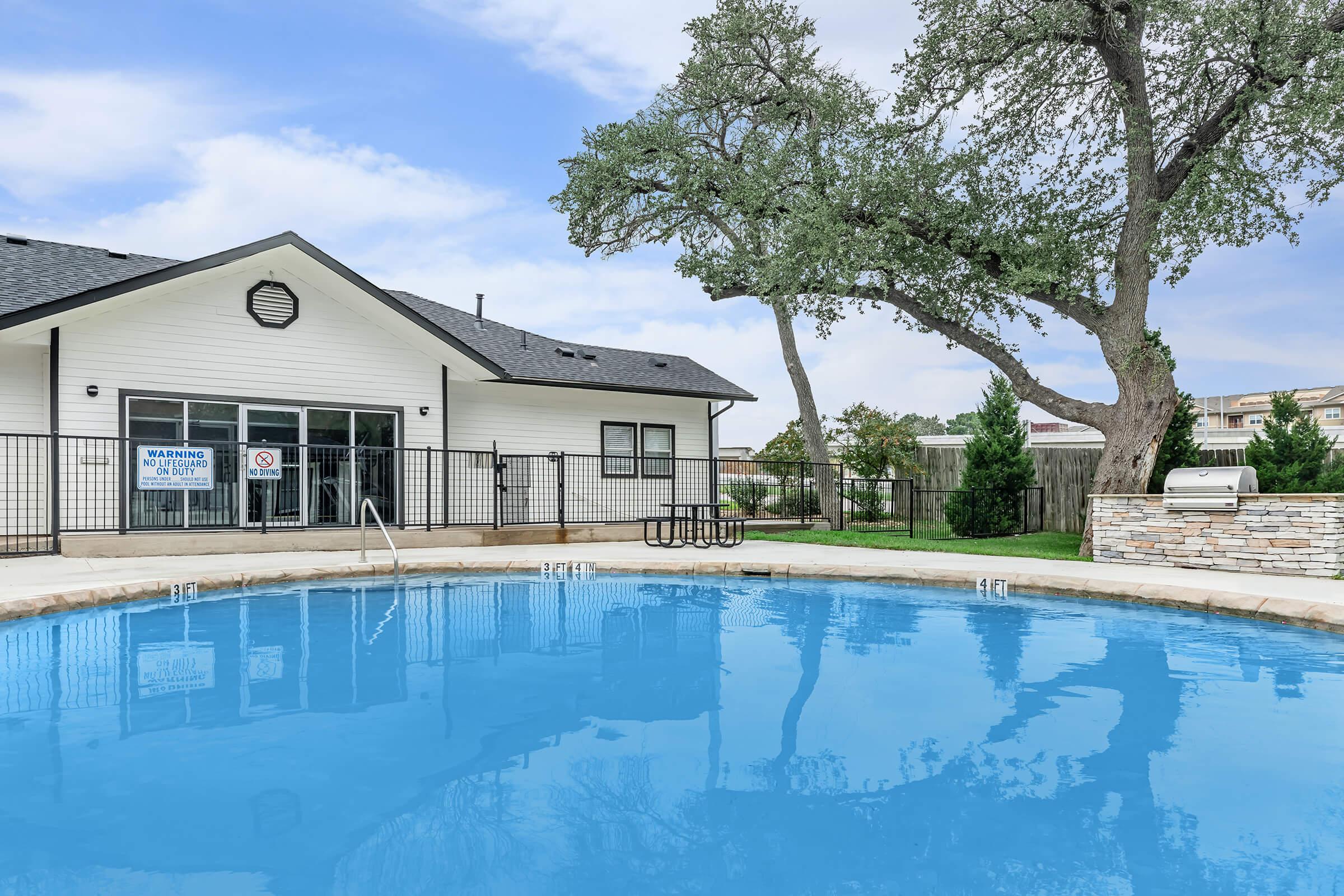 a small house in a pool of water