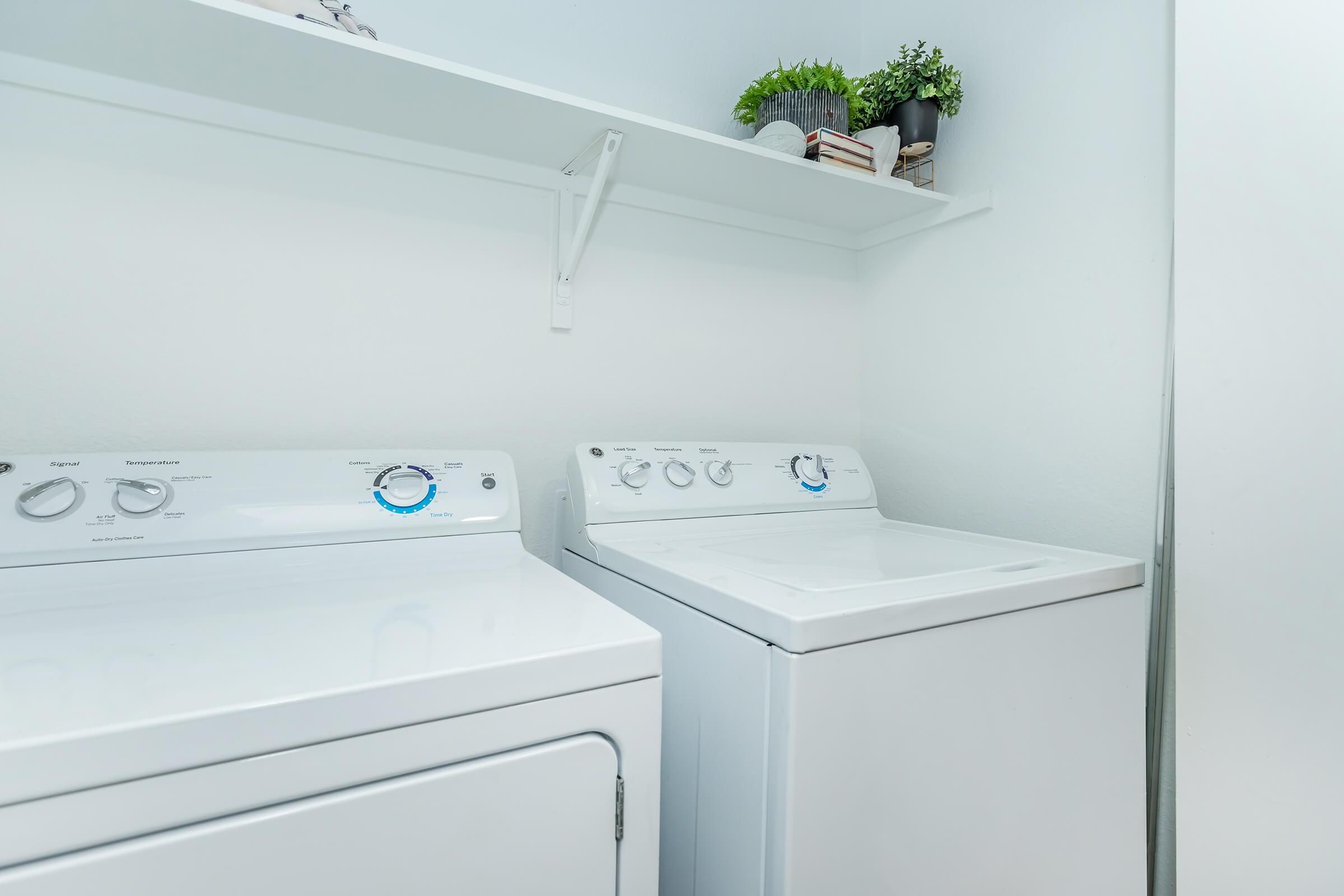 a stove top oven sitting inside of a refrigerator