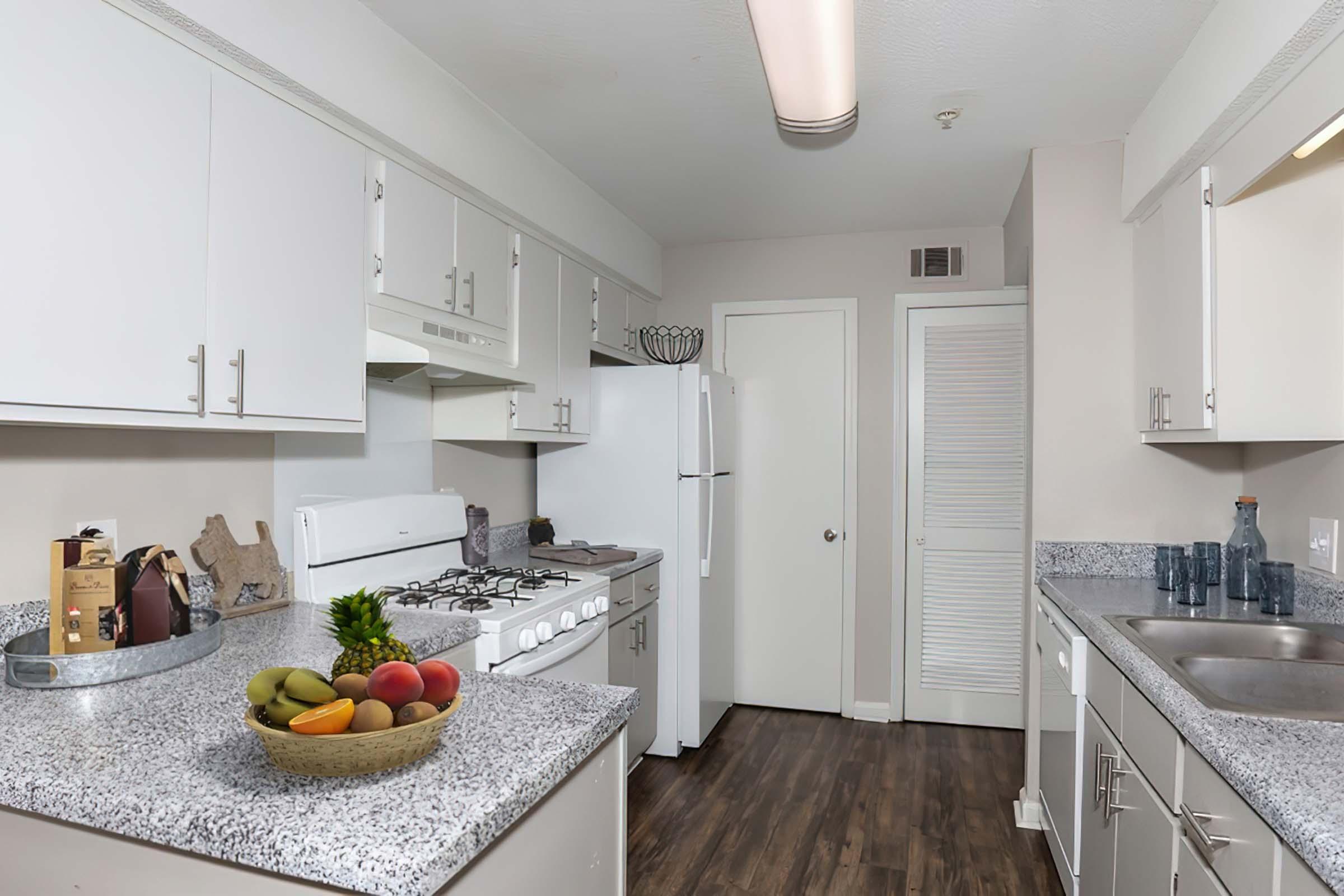 a kitchen with a sink and a counter