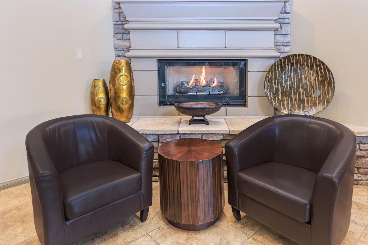 Catch Up with Friends Next to a Cozy Fire at The Equestrian on Eastern Apartments