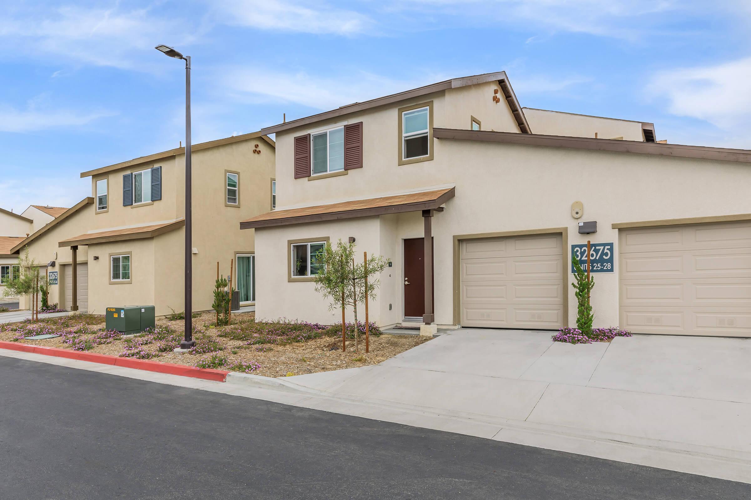 Cottages at Mission Trail community building with garages