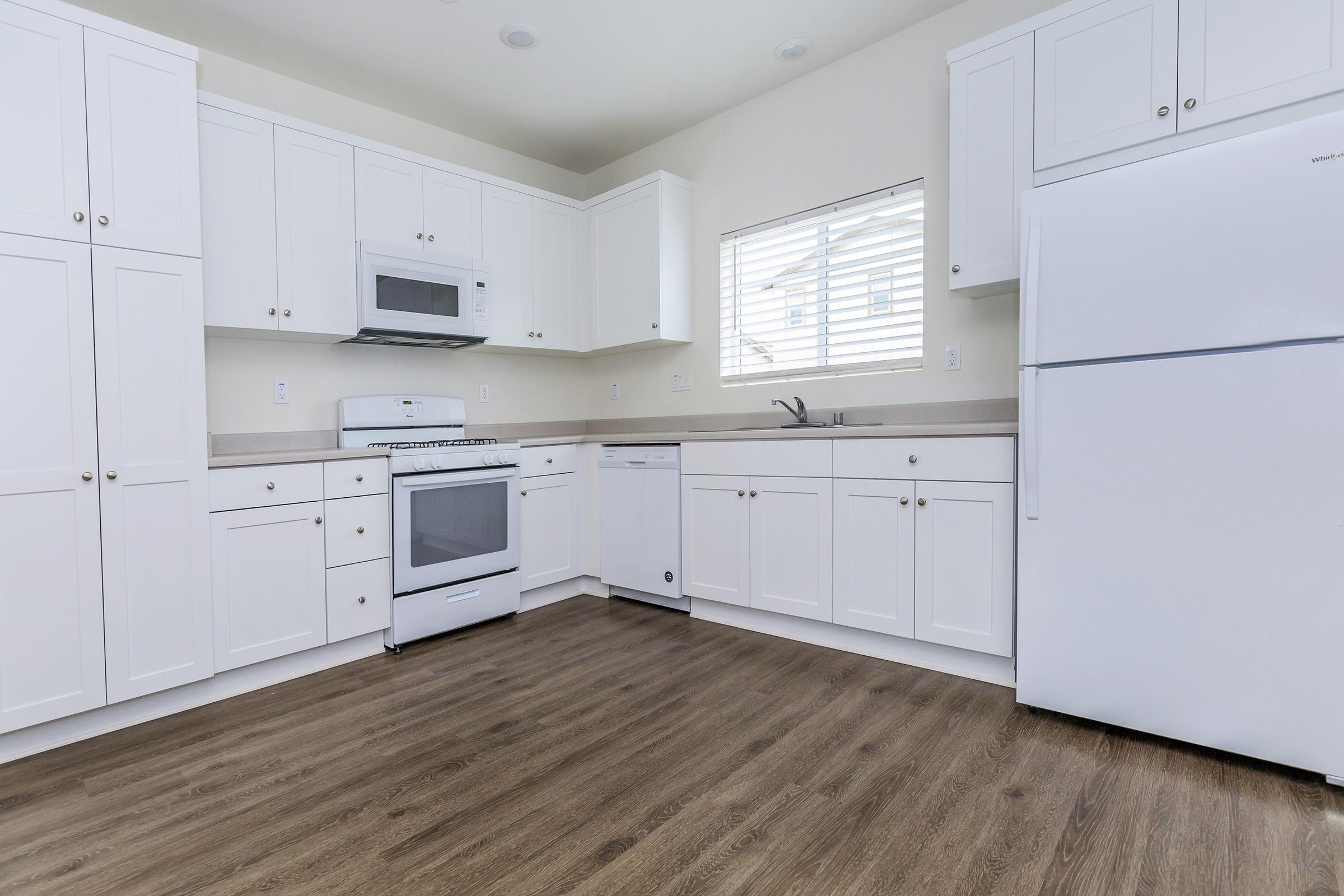 Kitchen with white appliaces