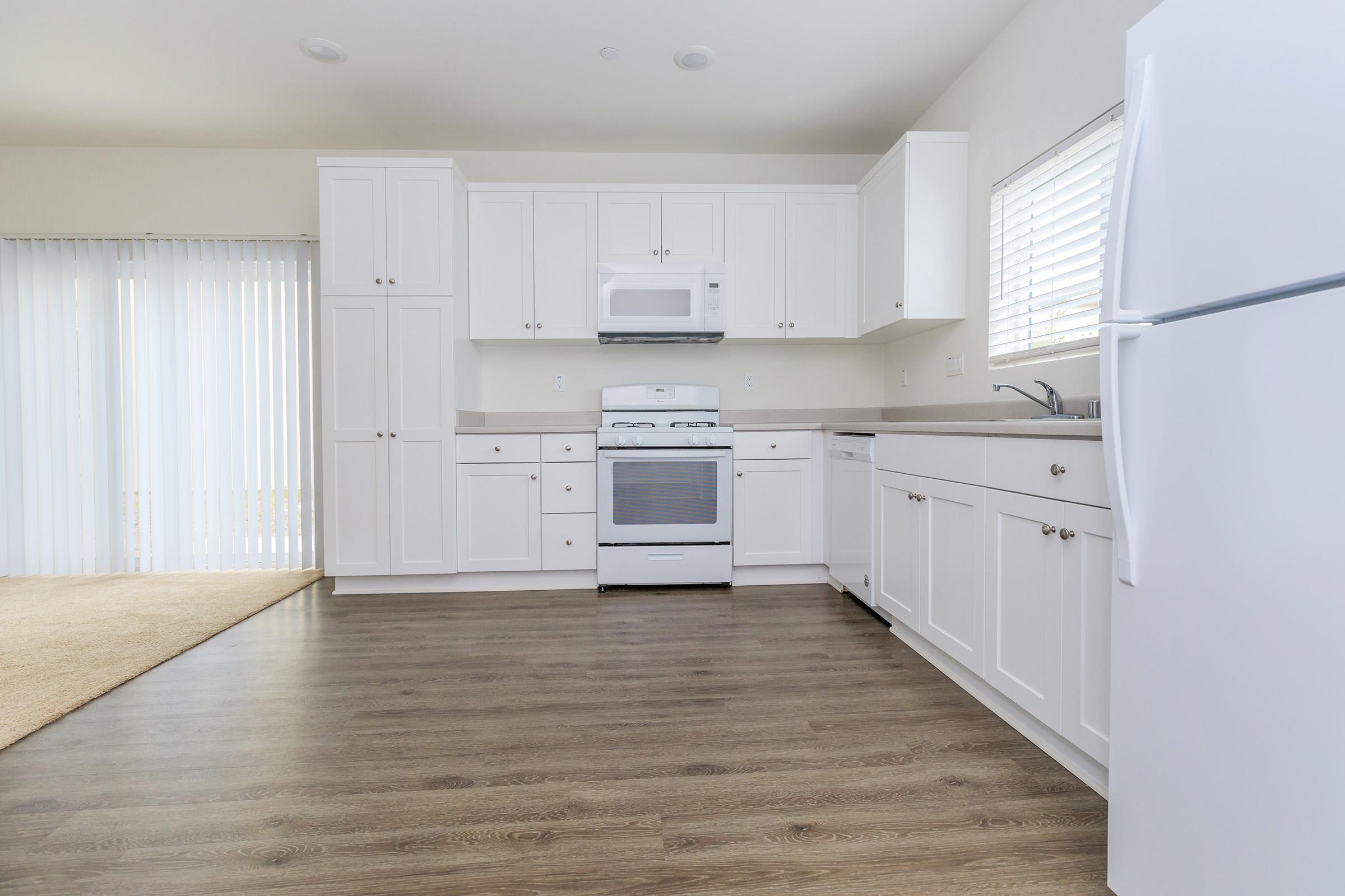 Kitchen with white cabinets