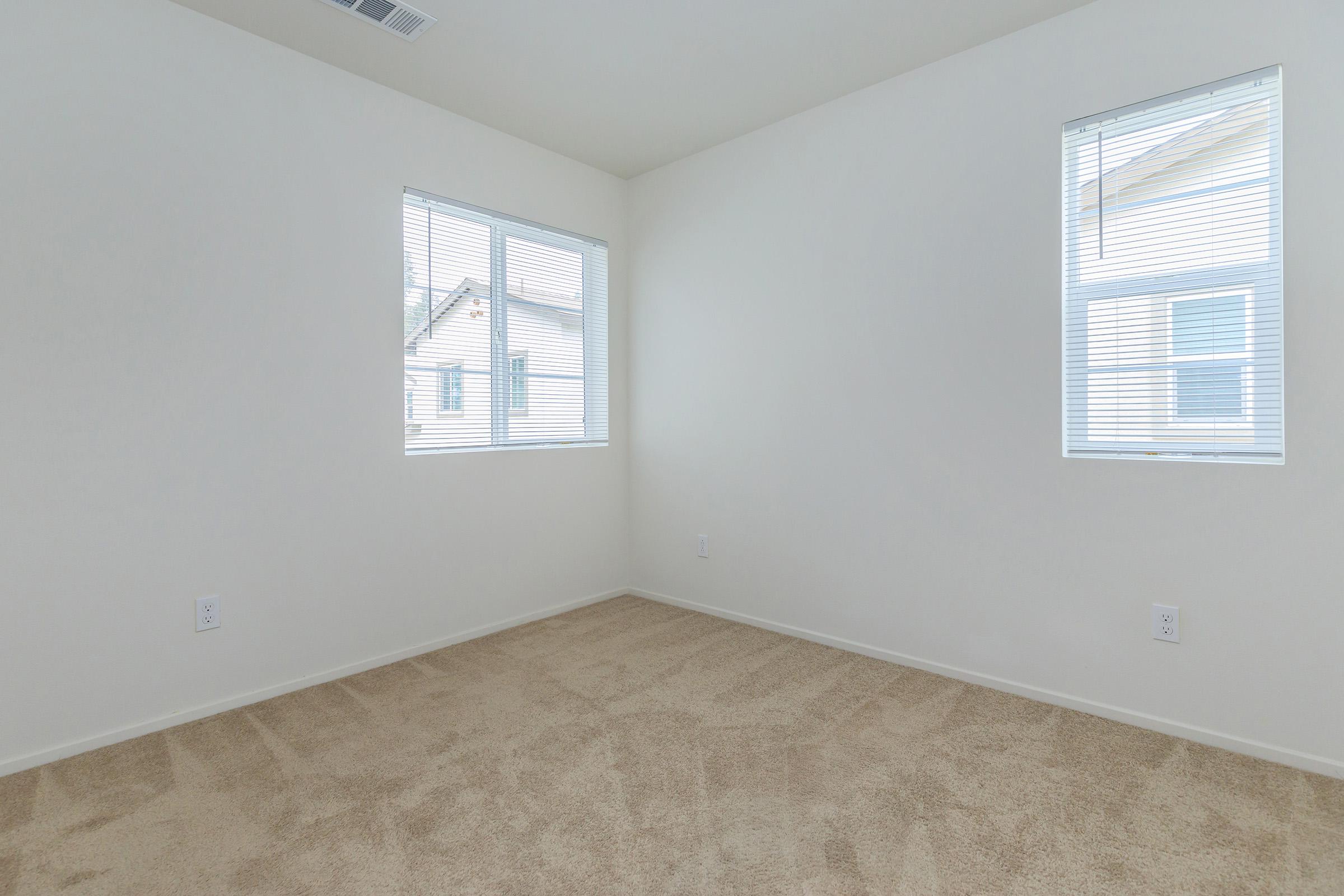 Carpeted vacant bedroom