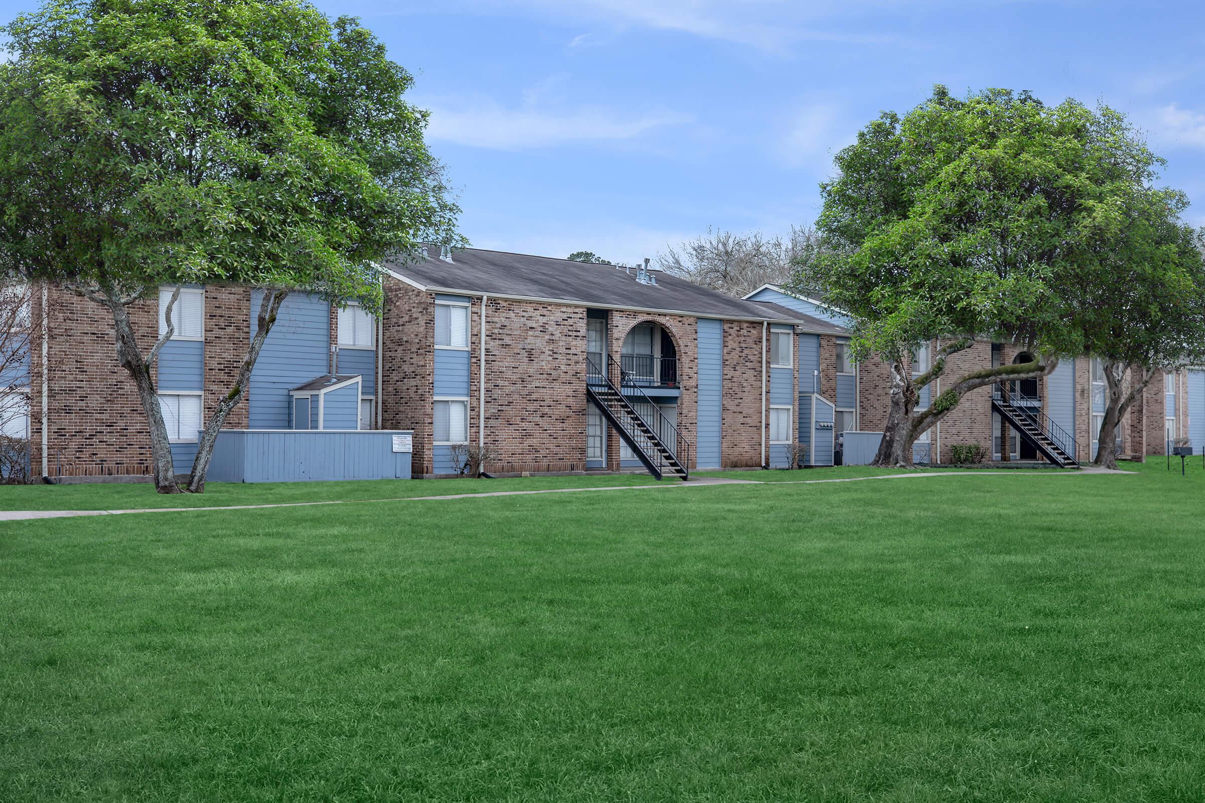 a large lawn in front of a house