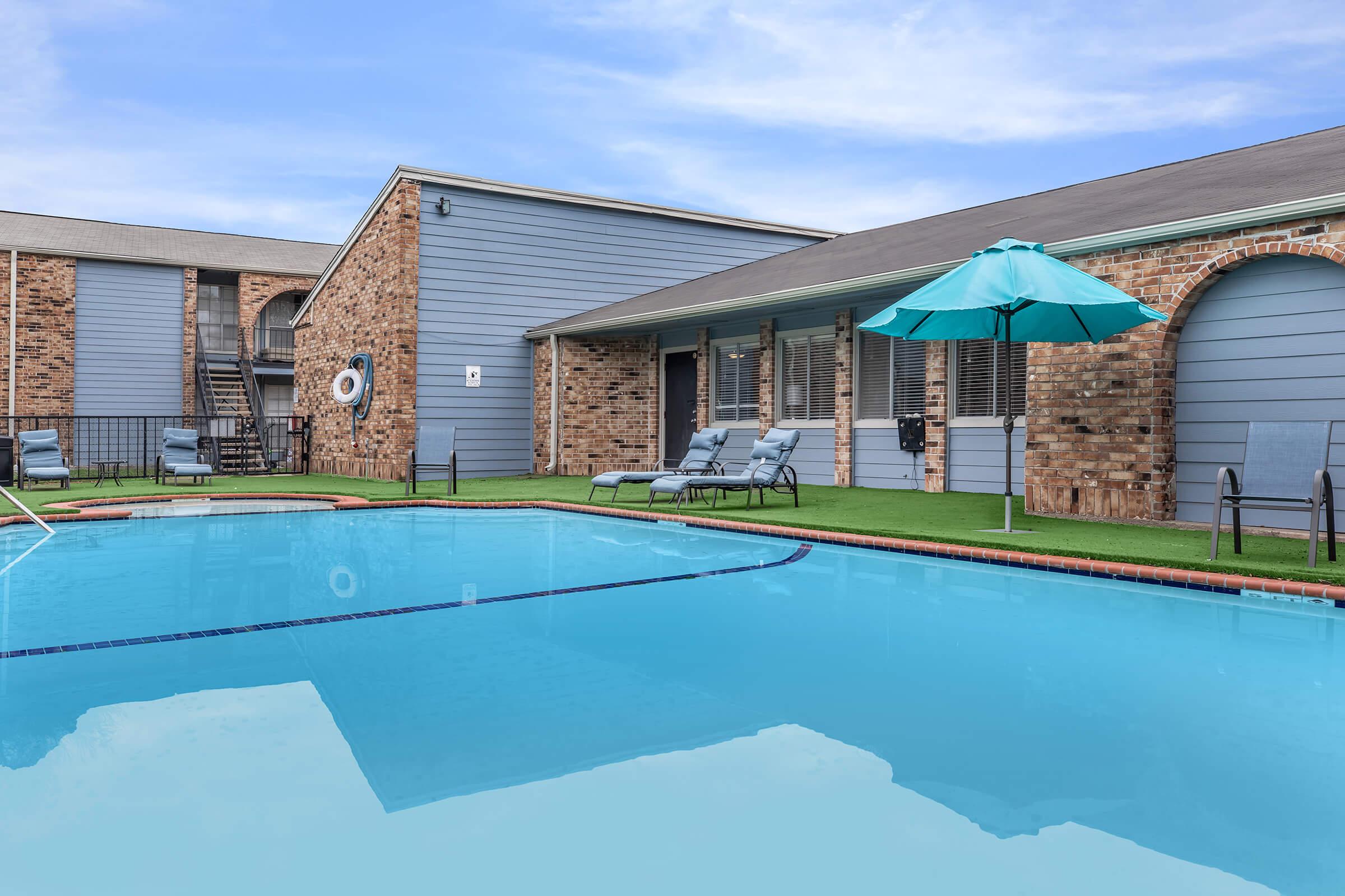 a house with a large pool of water