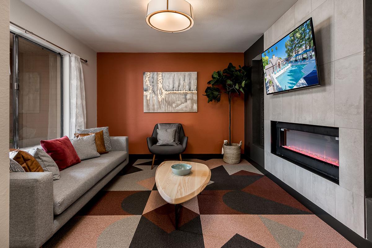 Comfortable TV Lounge with Couches - Coral Point Apartments - Mesa, Arizona