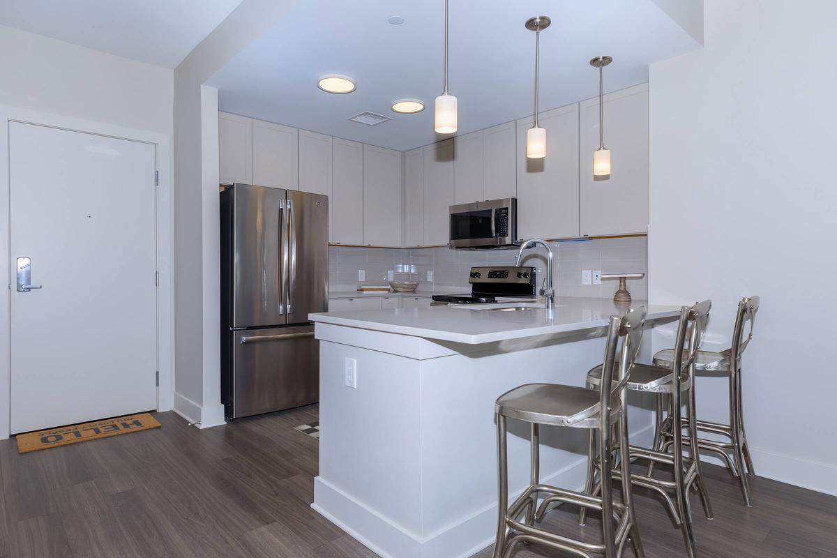 a kitchen with a dining table