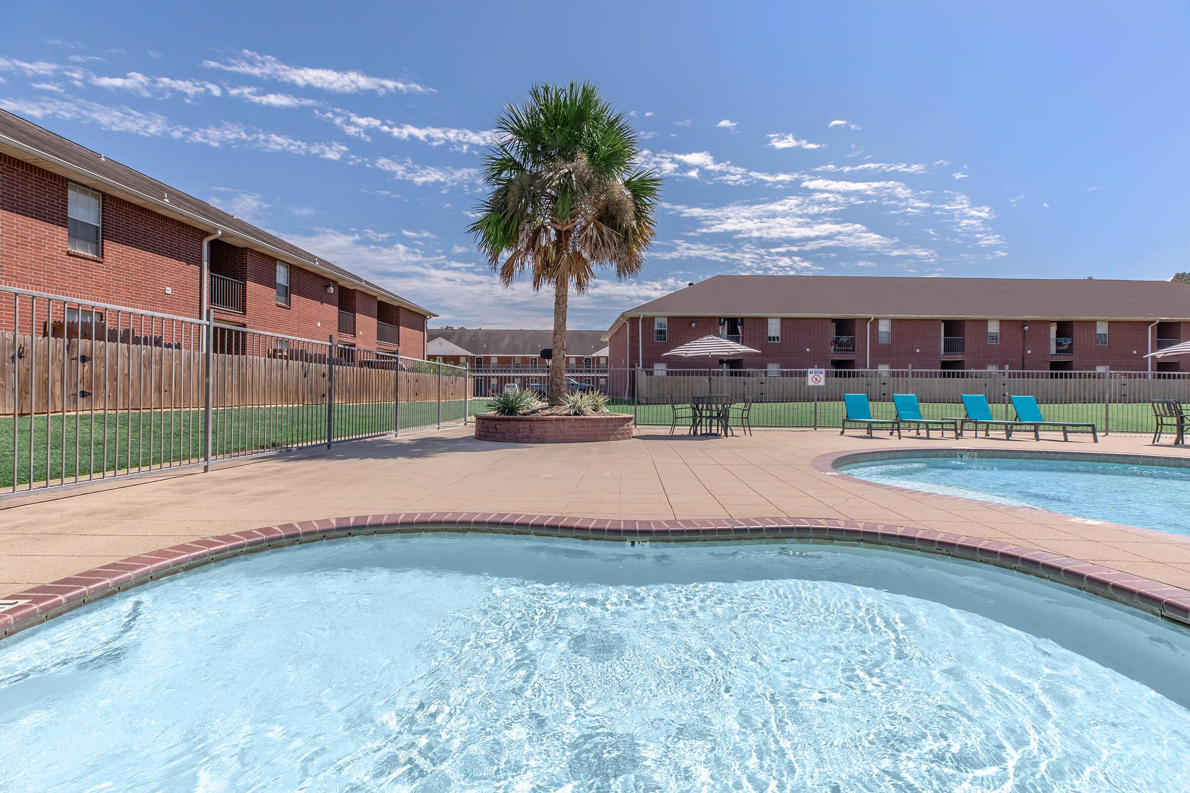 a pool next to a building