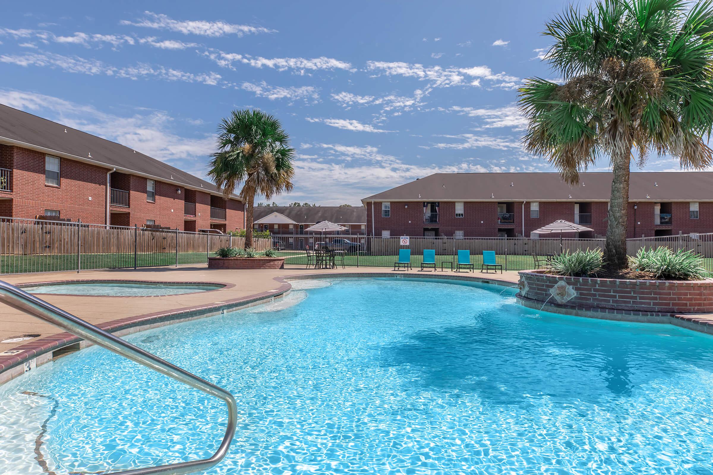 a pool next to a body of water