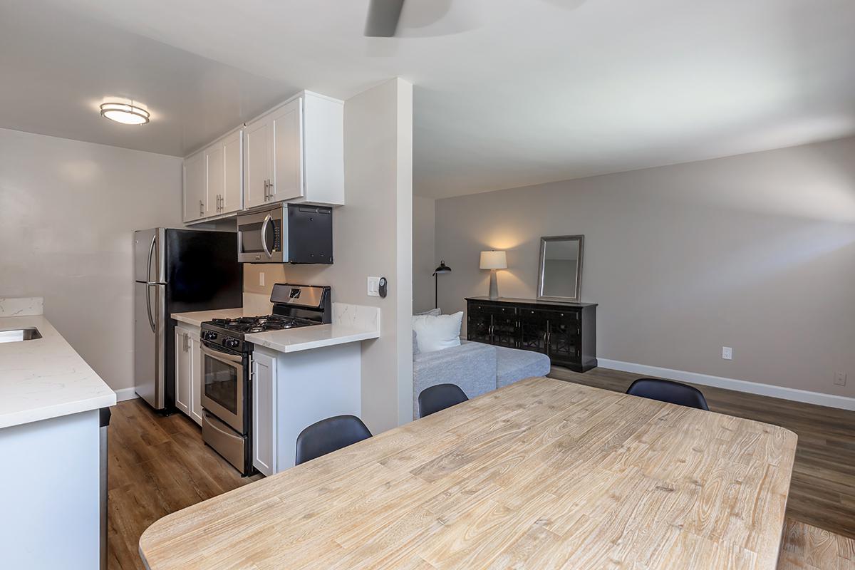 Flats on Elk provides stainless steel appliances, featuring an over the stove microwave.