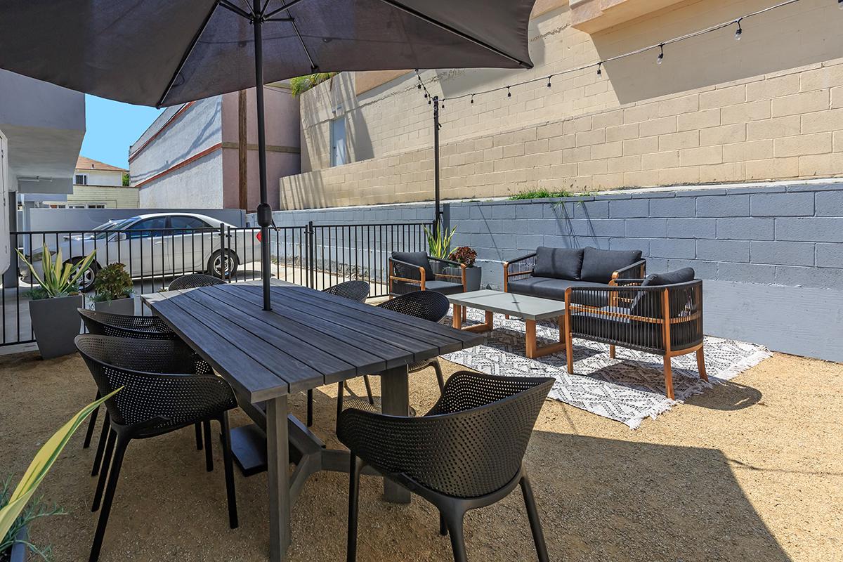 Enjoy our barbecue area here at Flats on Elk that has seating and umbrellas to shade you.