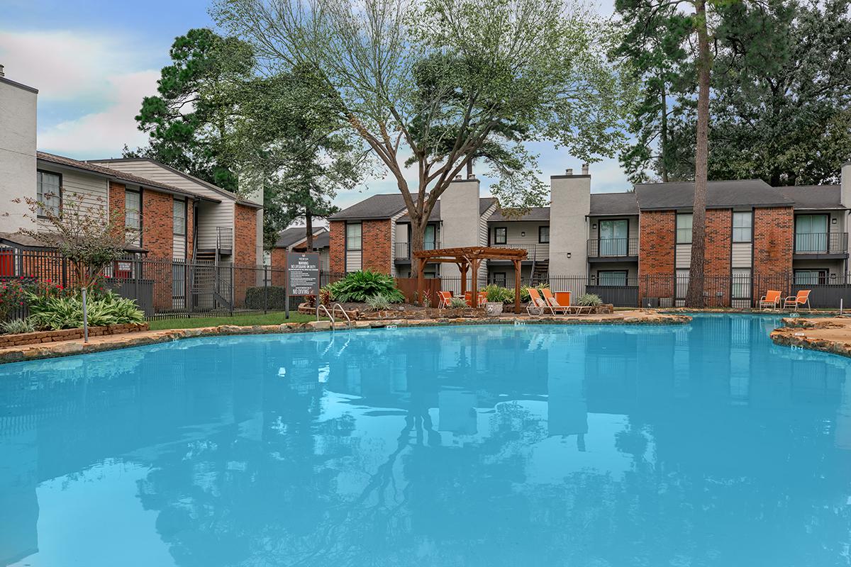 a house with a large pool of water