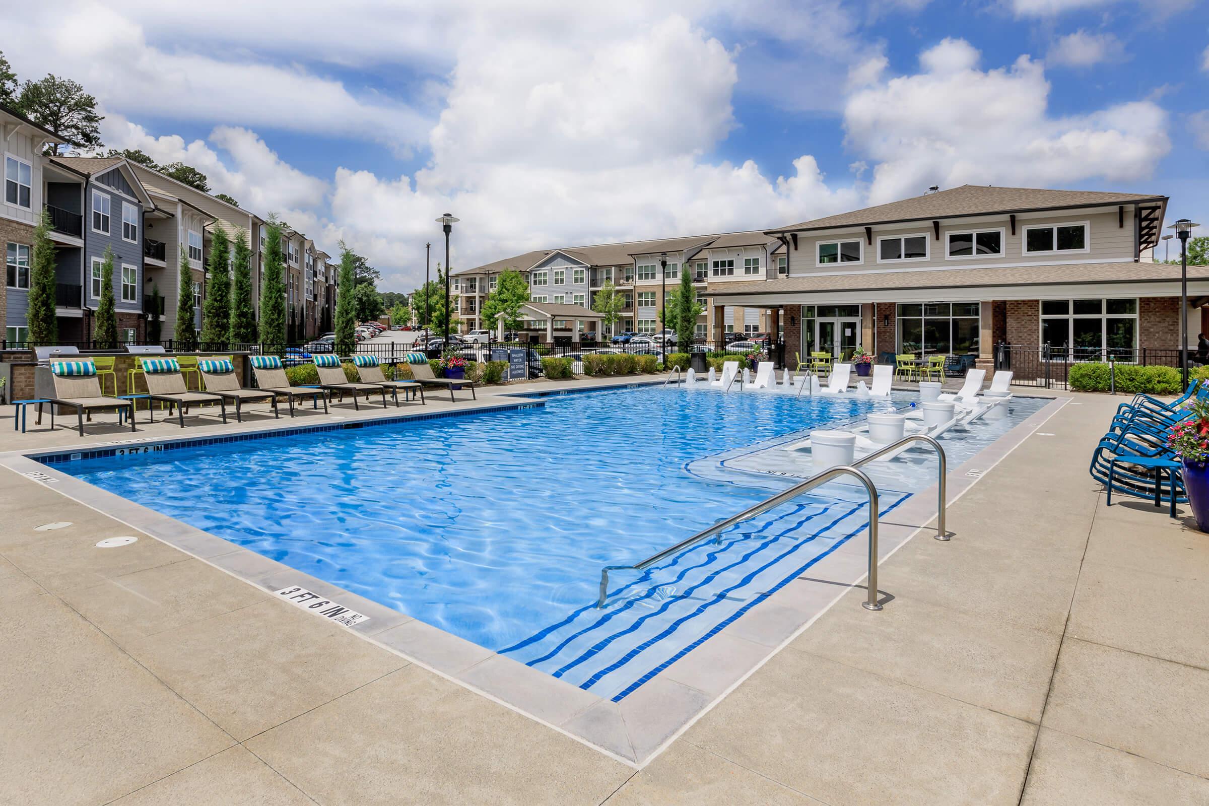 a pool next to a building