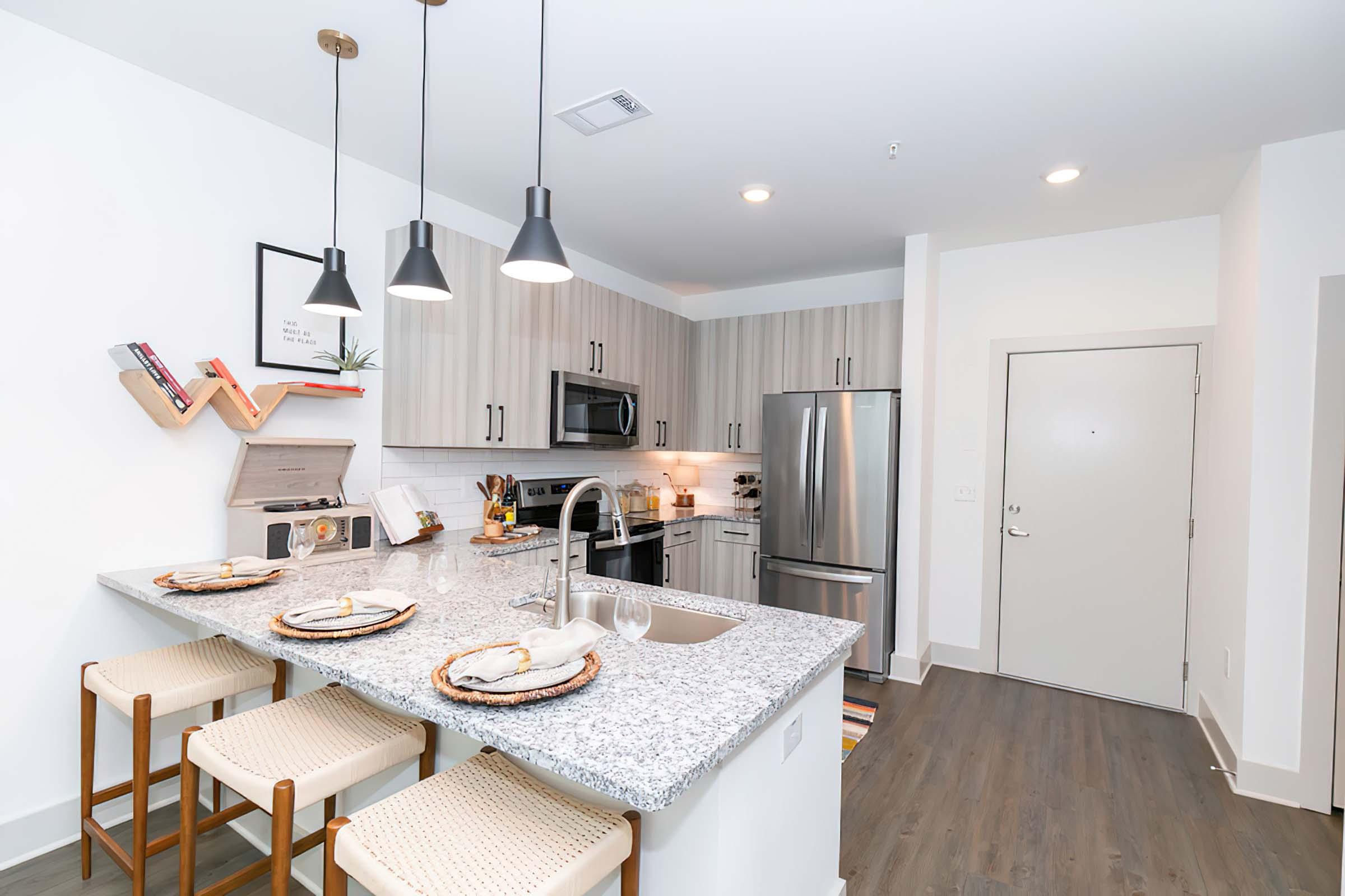 a kitchen with a dining table