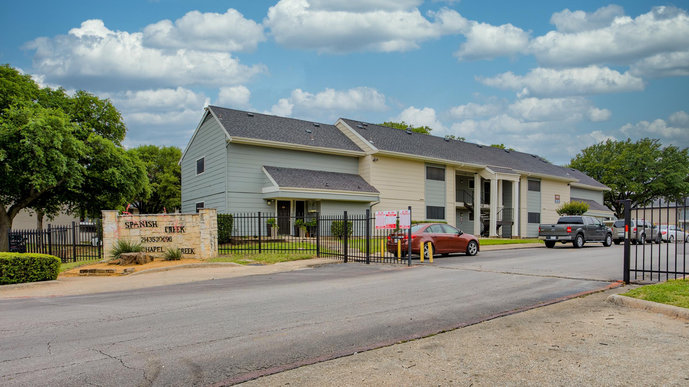 a small house in a parking lot