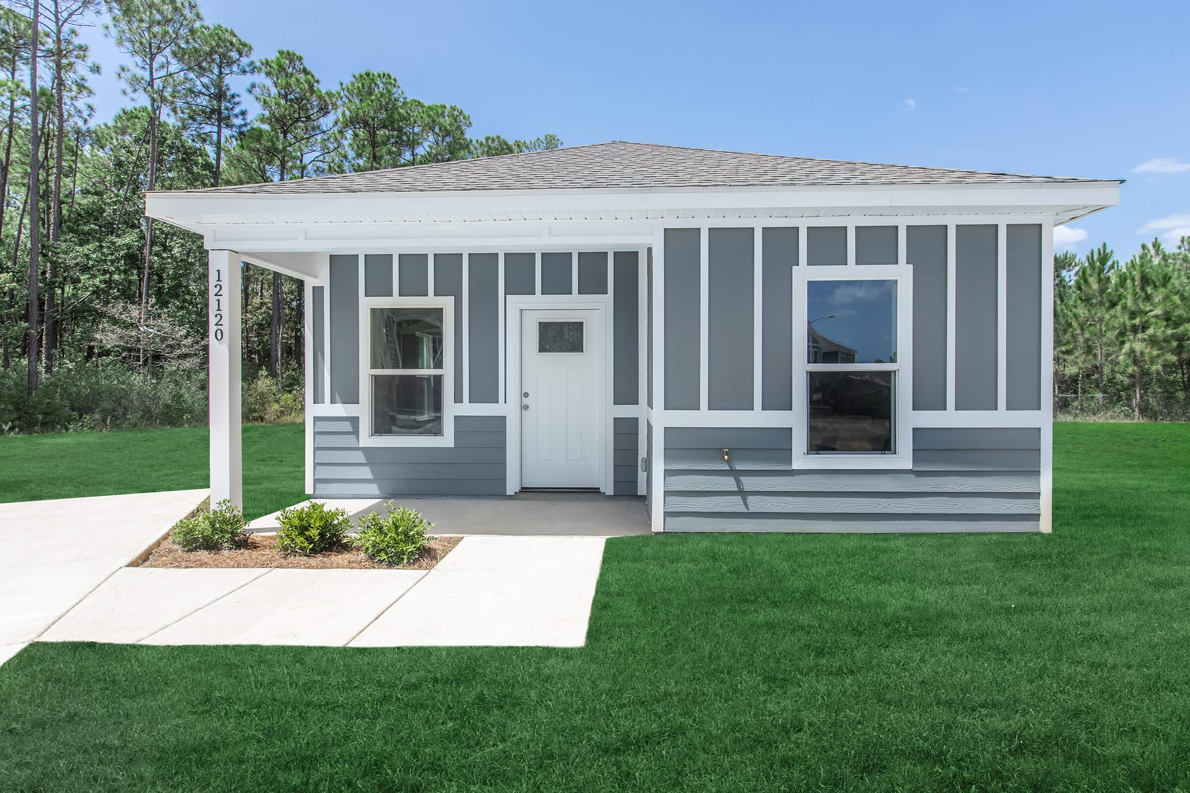 a large lawn in front of a house