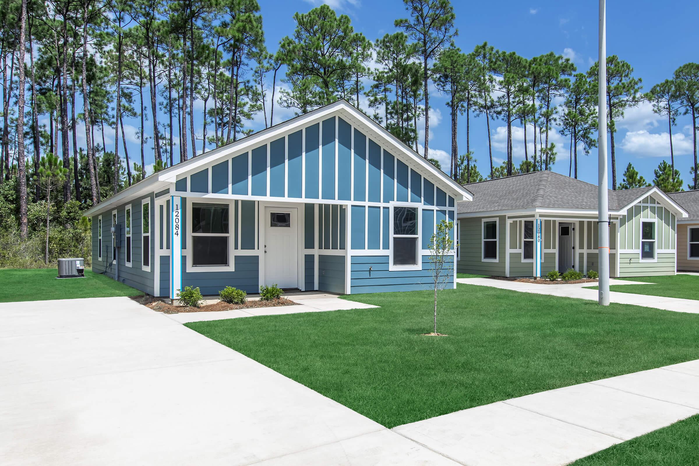 a large lawn in front of a house