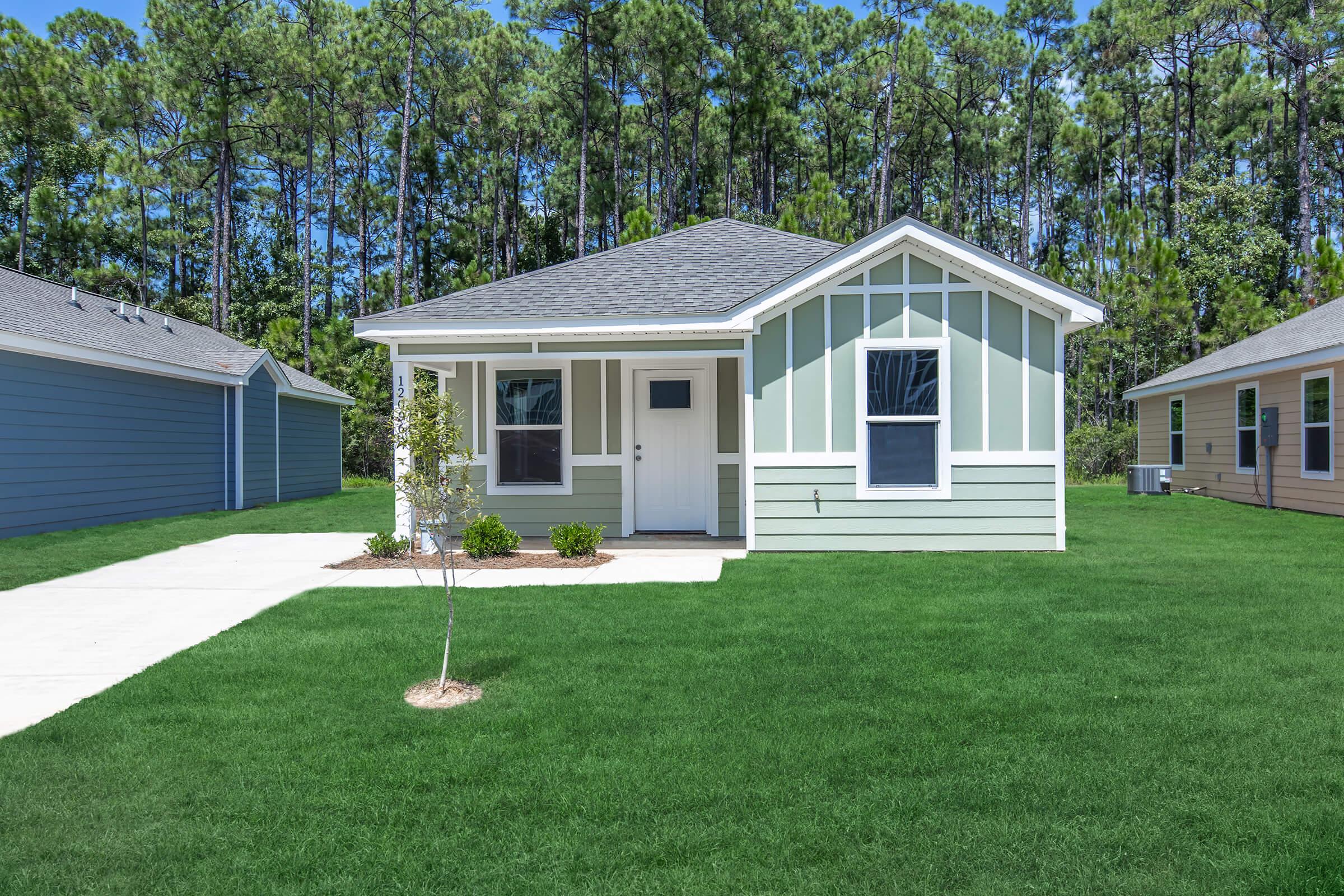 a large lawn in front of a house