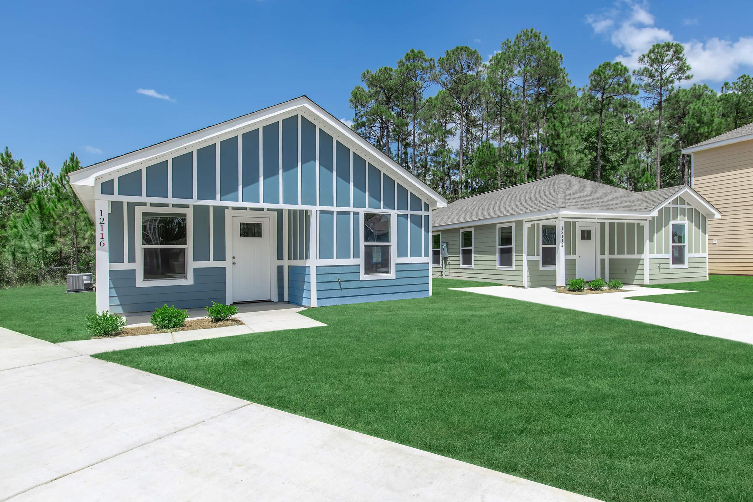 a large lawn in front of a house