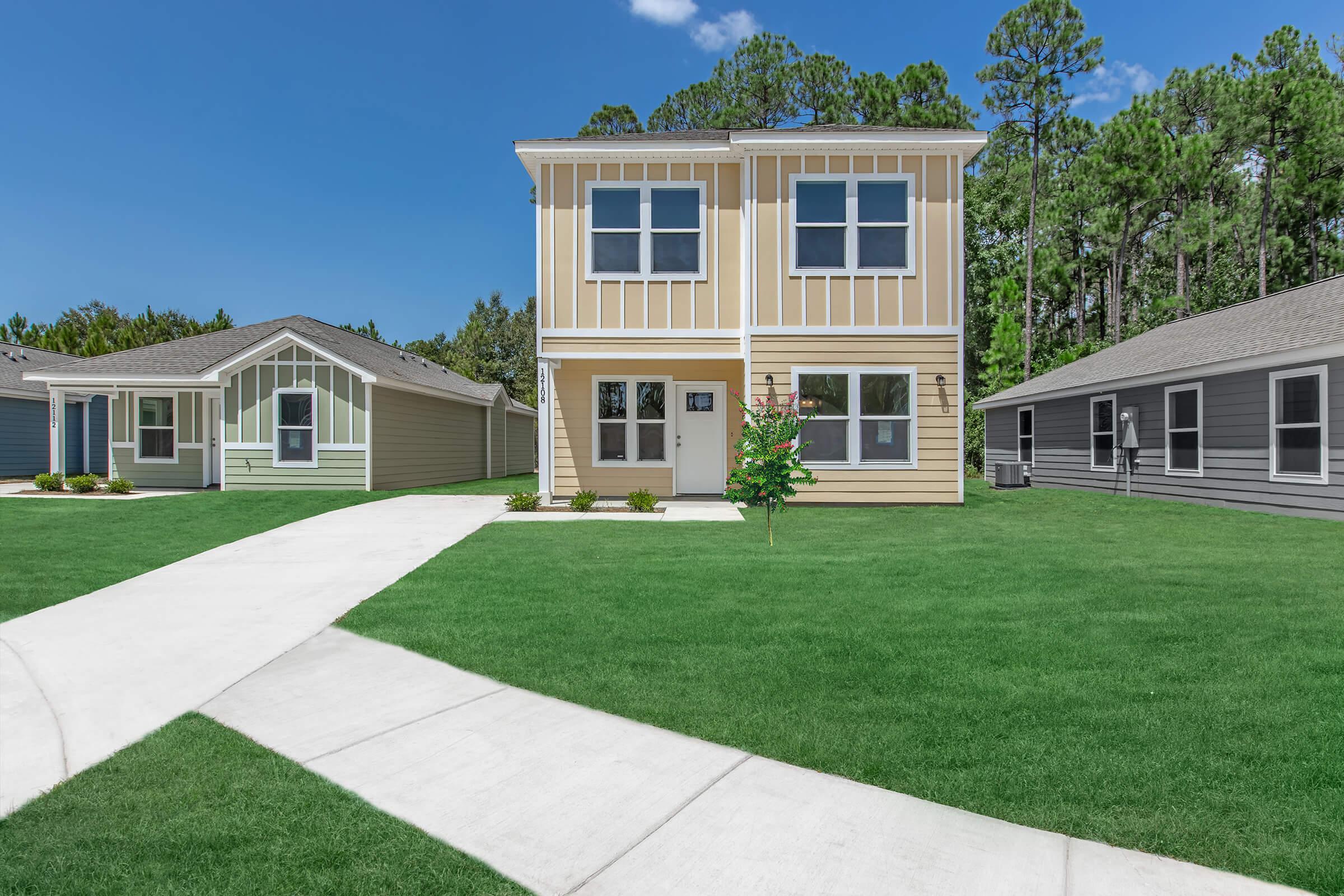 a large lawn in front of a house