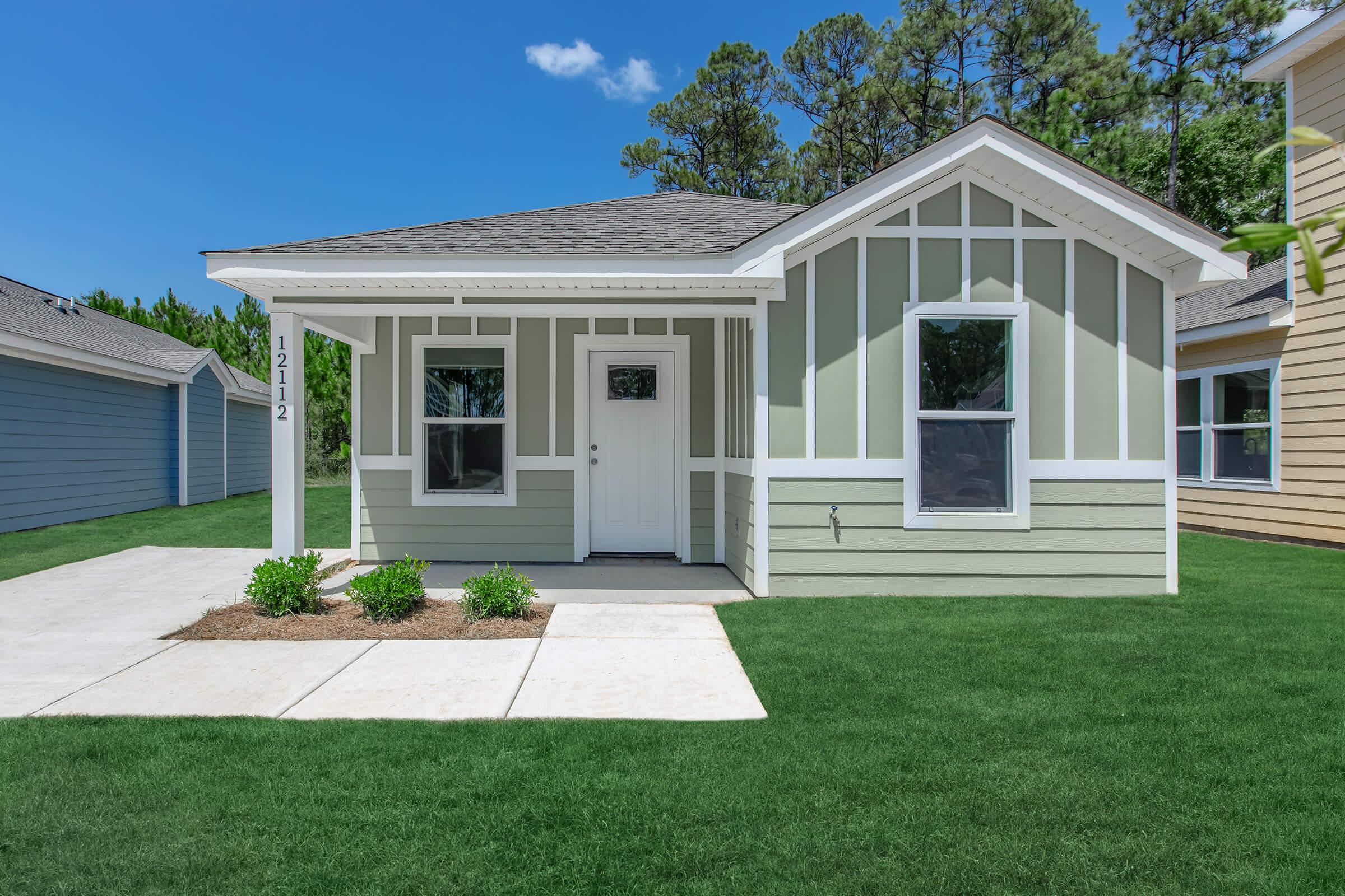 a large lawn in front of a house