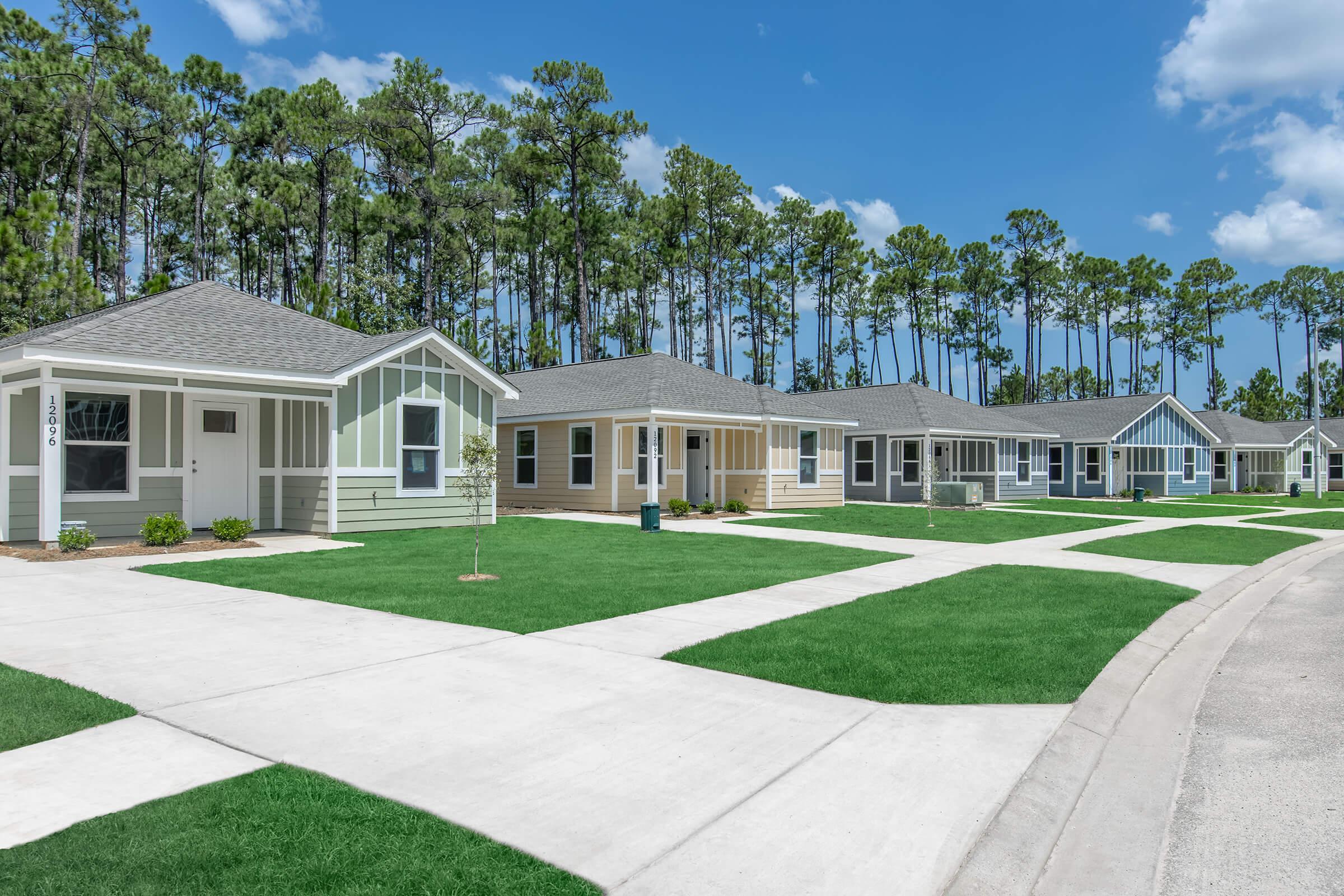 a house with trees in the background