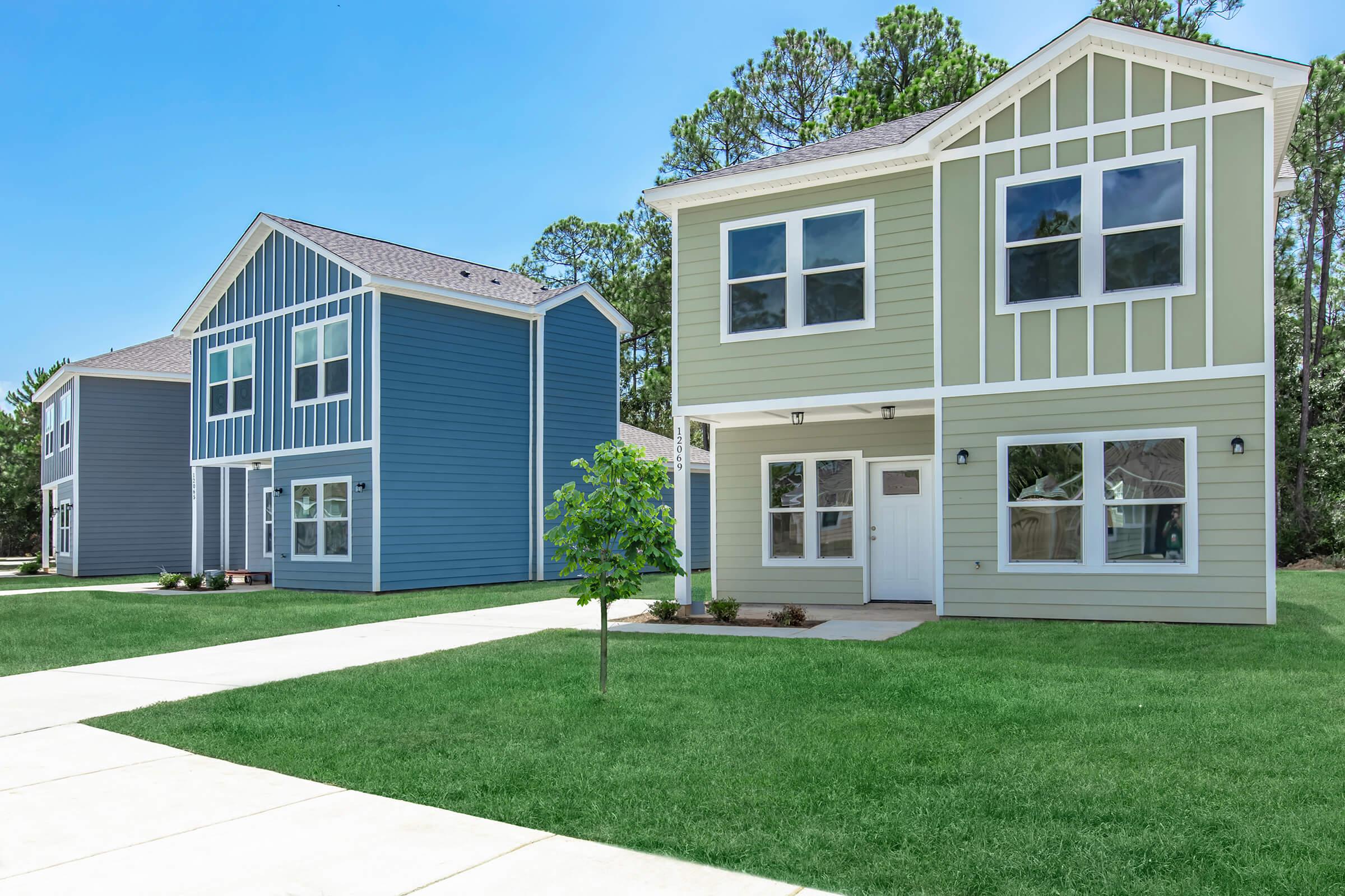 a large lawn in front of a house