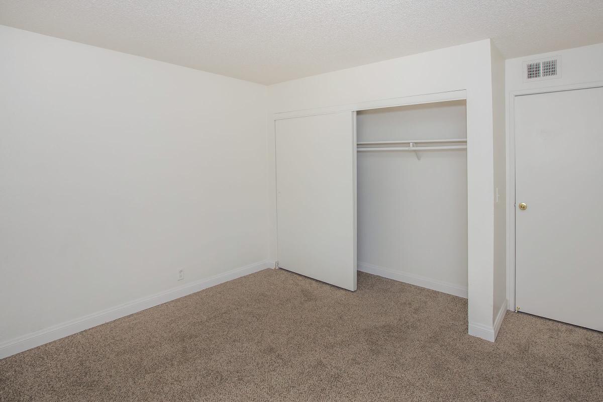 a white refrigerator freezer sitting in a room