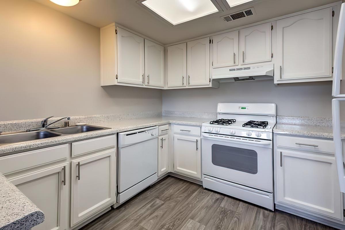 a kitchen with a stove top oven