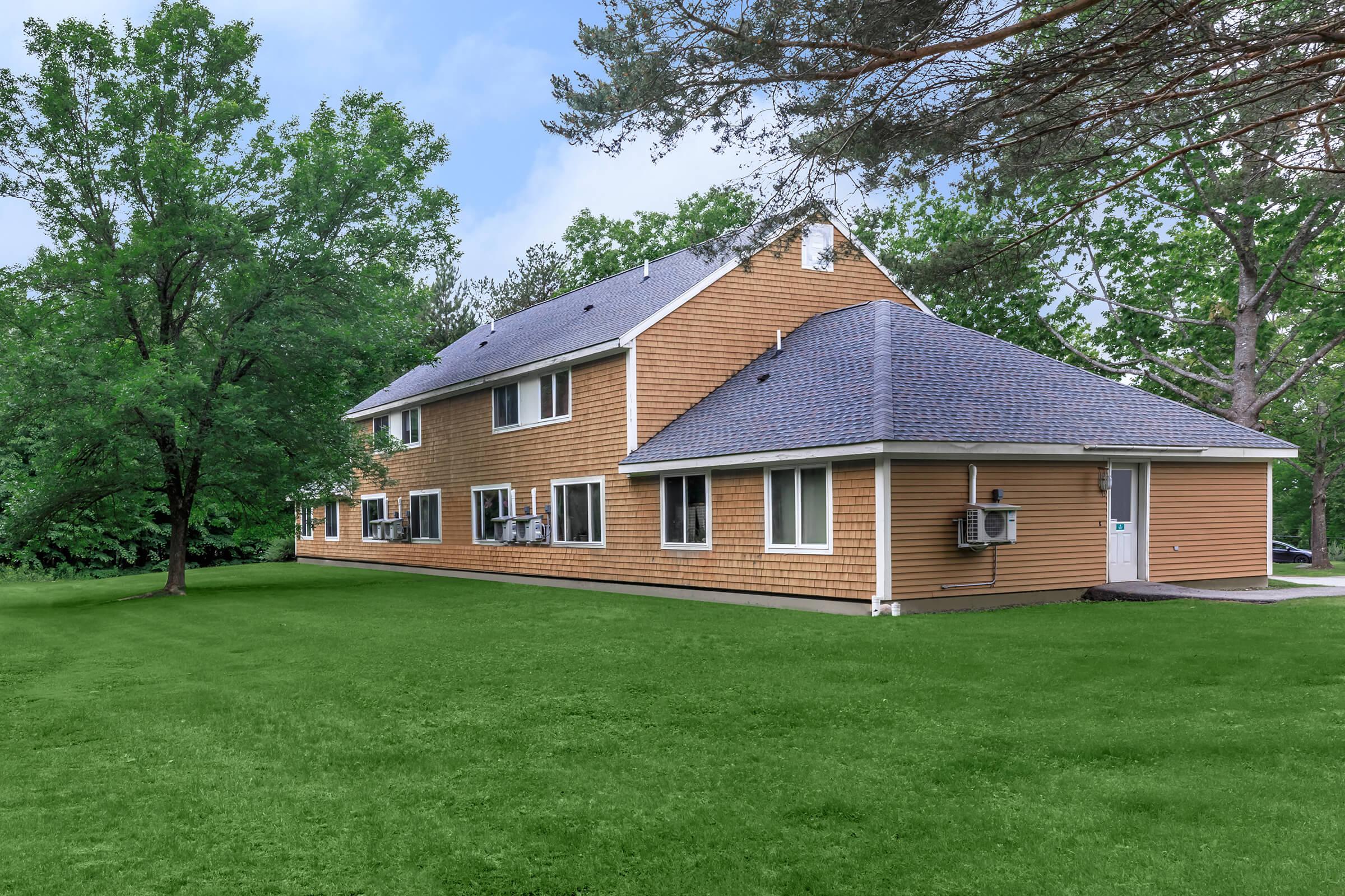 a large lawn in front of a house