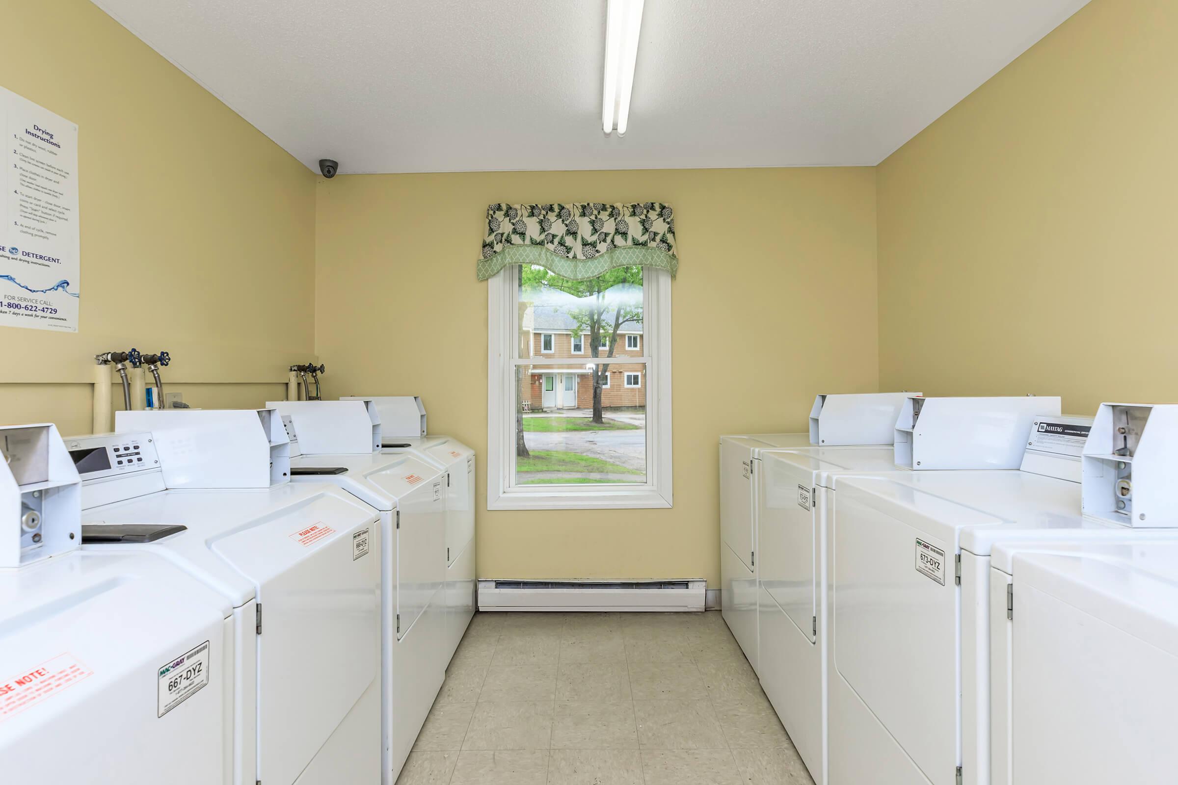 a large white refrigerator in a kitchen