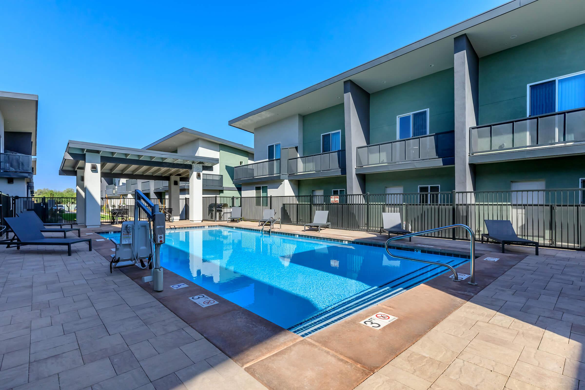 a pool next to a building