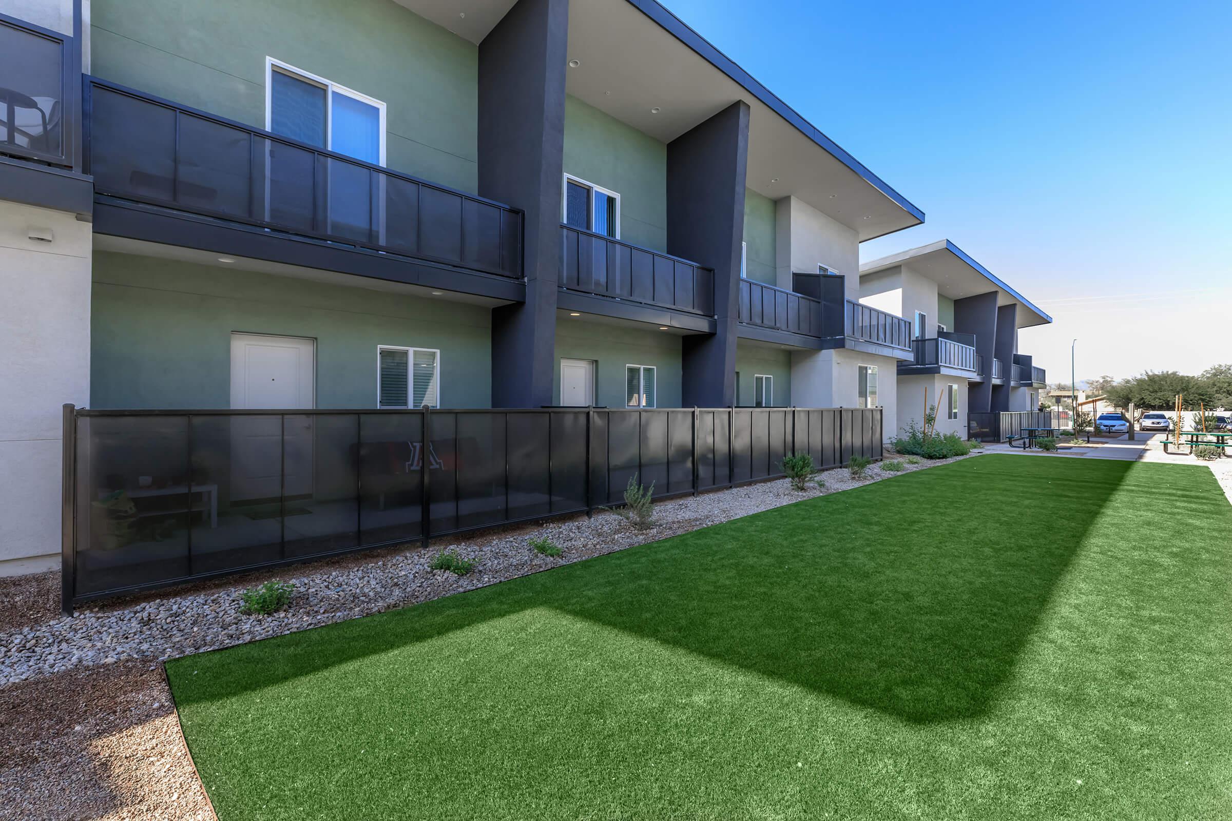 a large lawn in front of a building