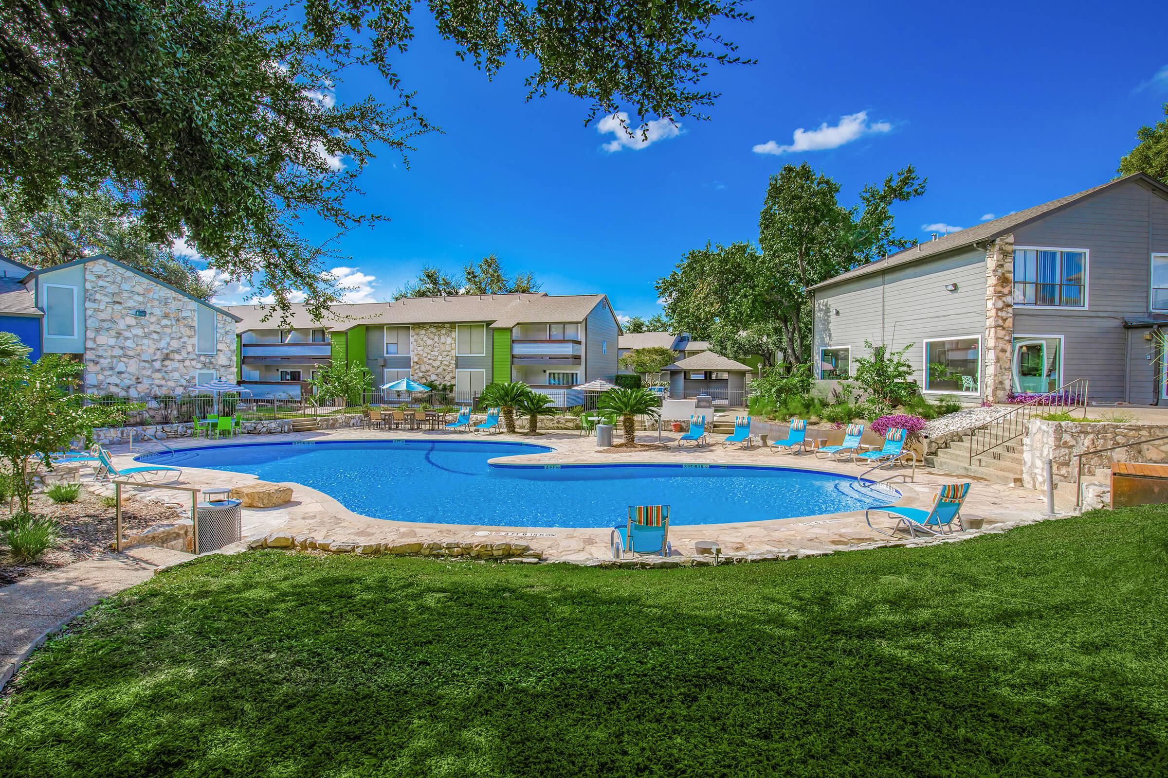 a large lawn in front of a house