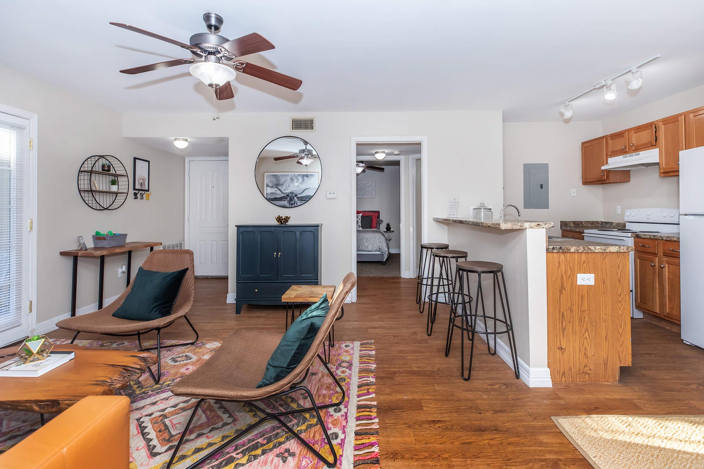 a living room filled with lots of furniture