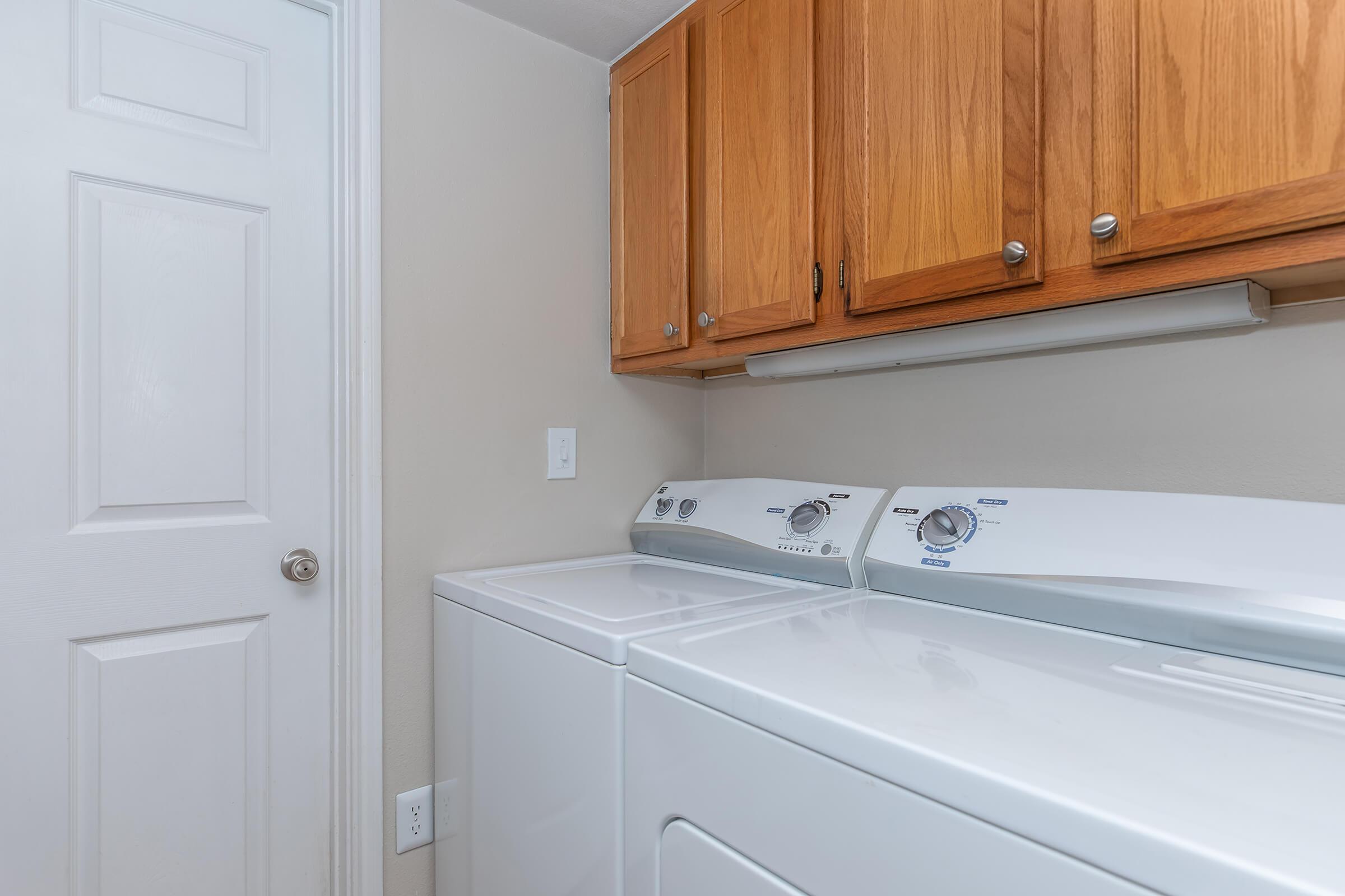 a kitchen with a sink and a microwave