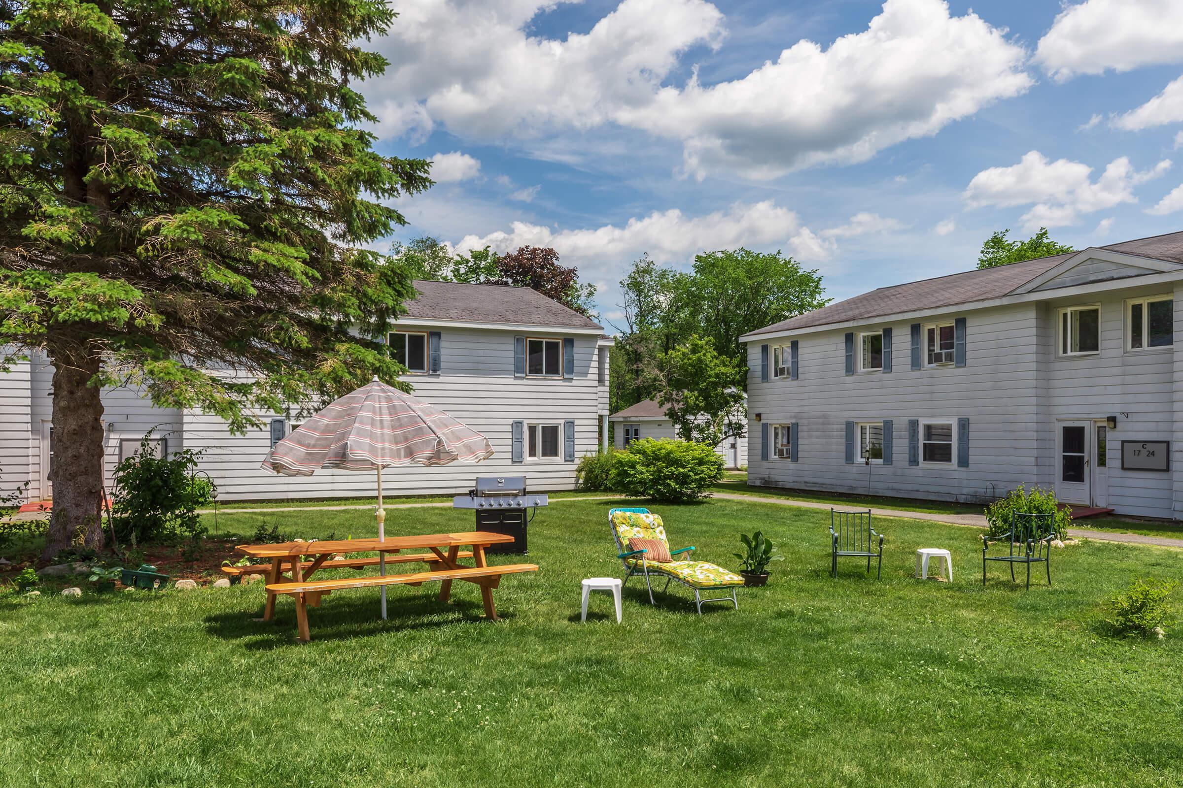 a large lawn in front of a house