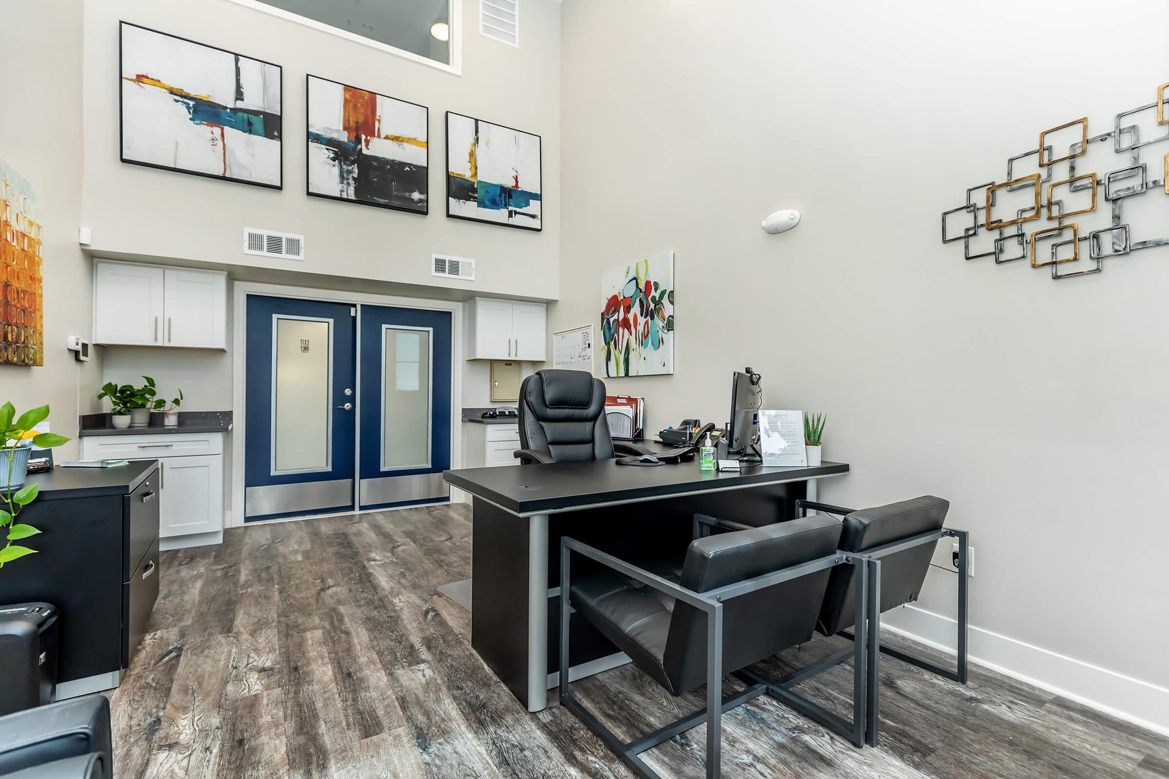 a living room filled with furniture and a tv