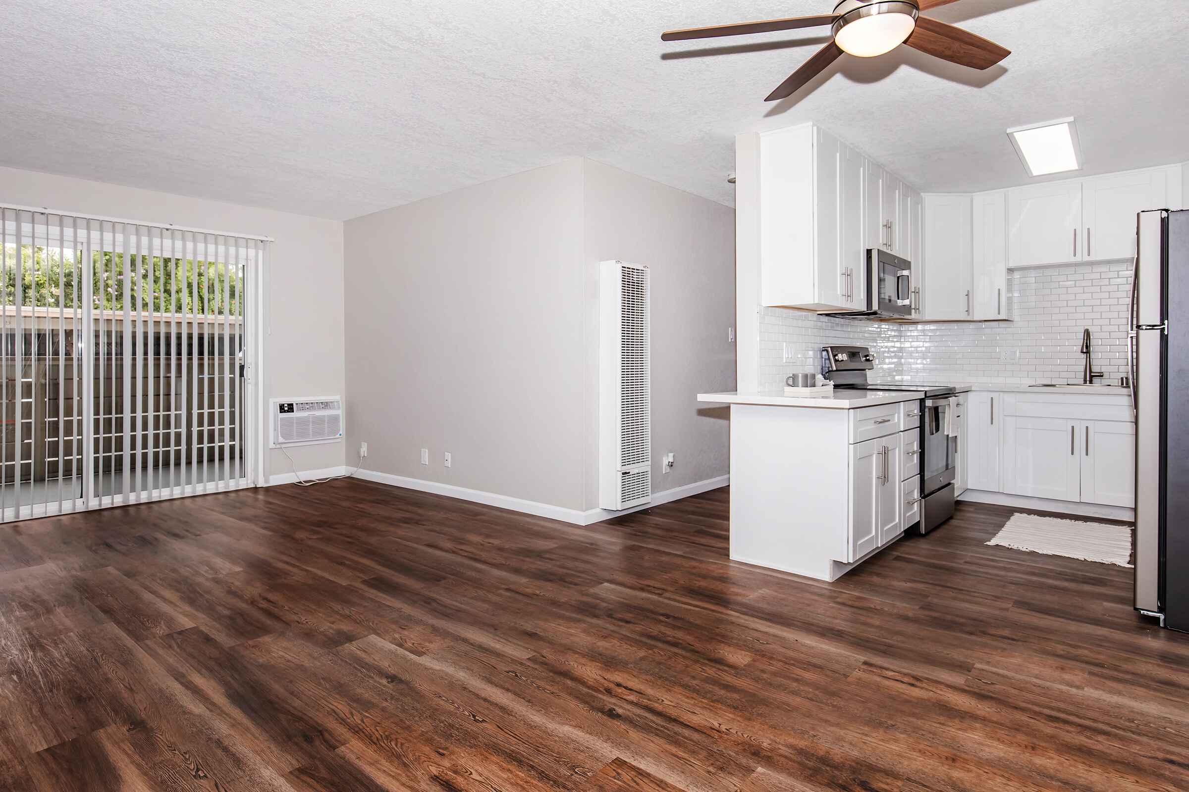 a room filled with furniture and a wood floor