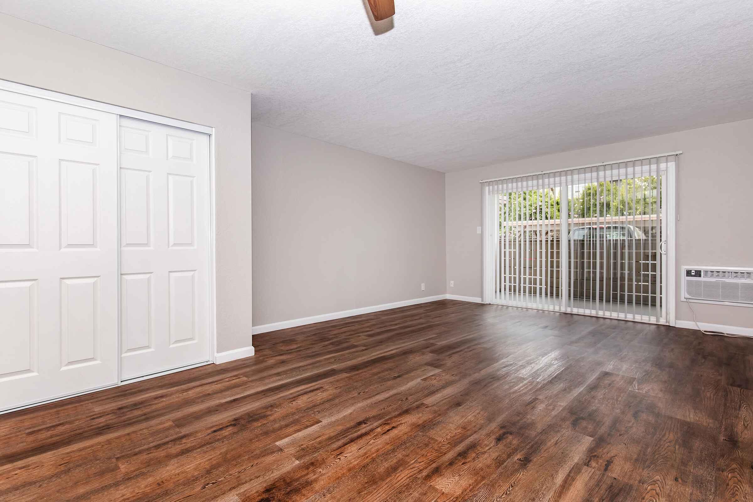 a room filled with furniture and a large window