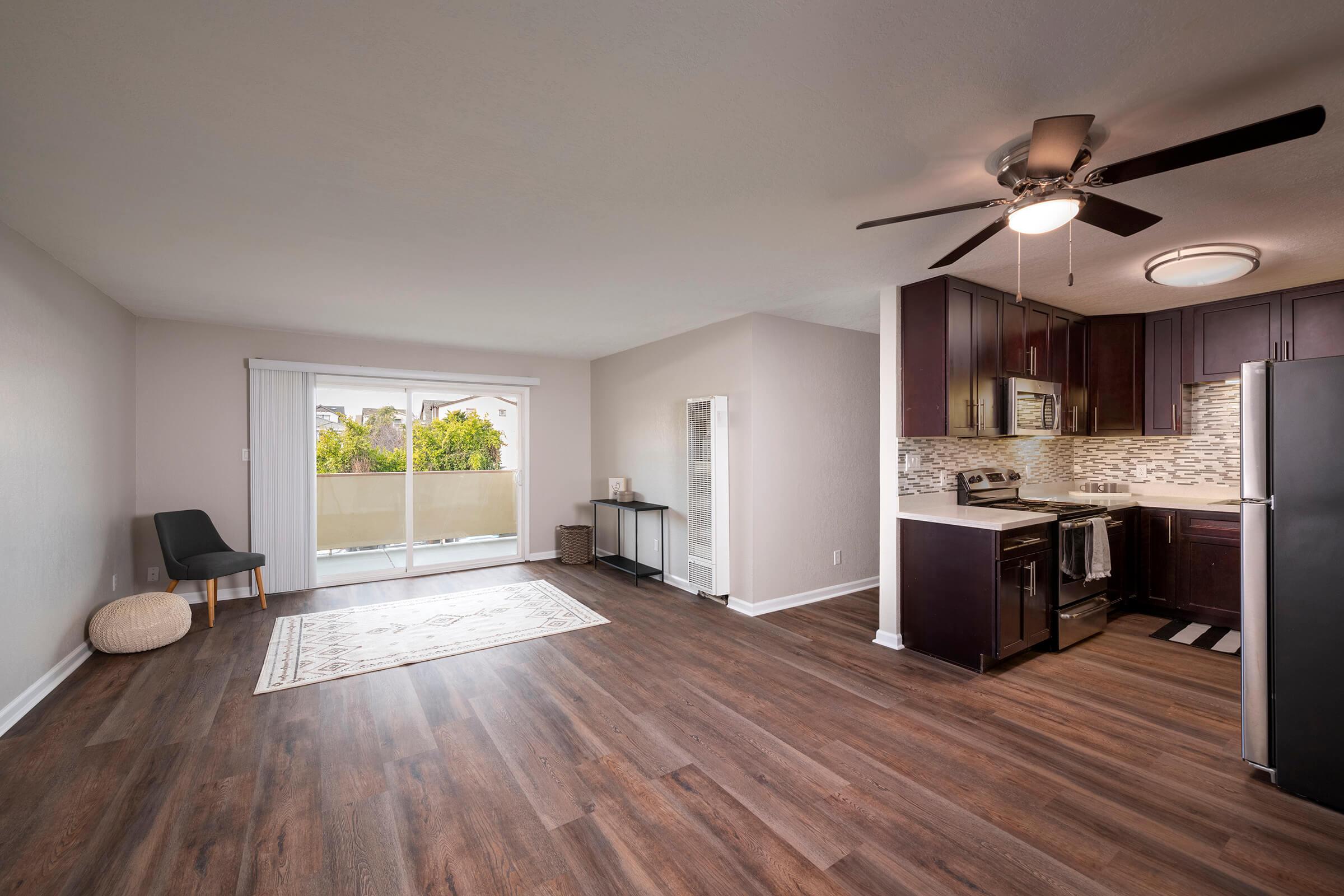 a view of a living room with a wood floor