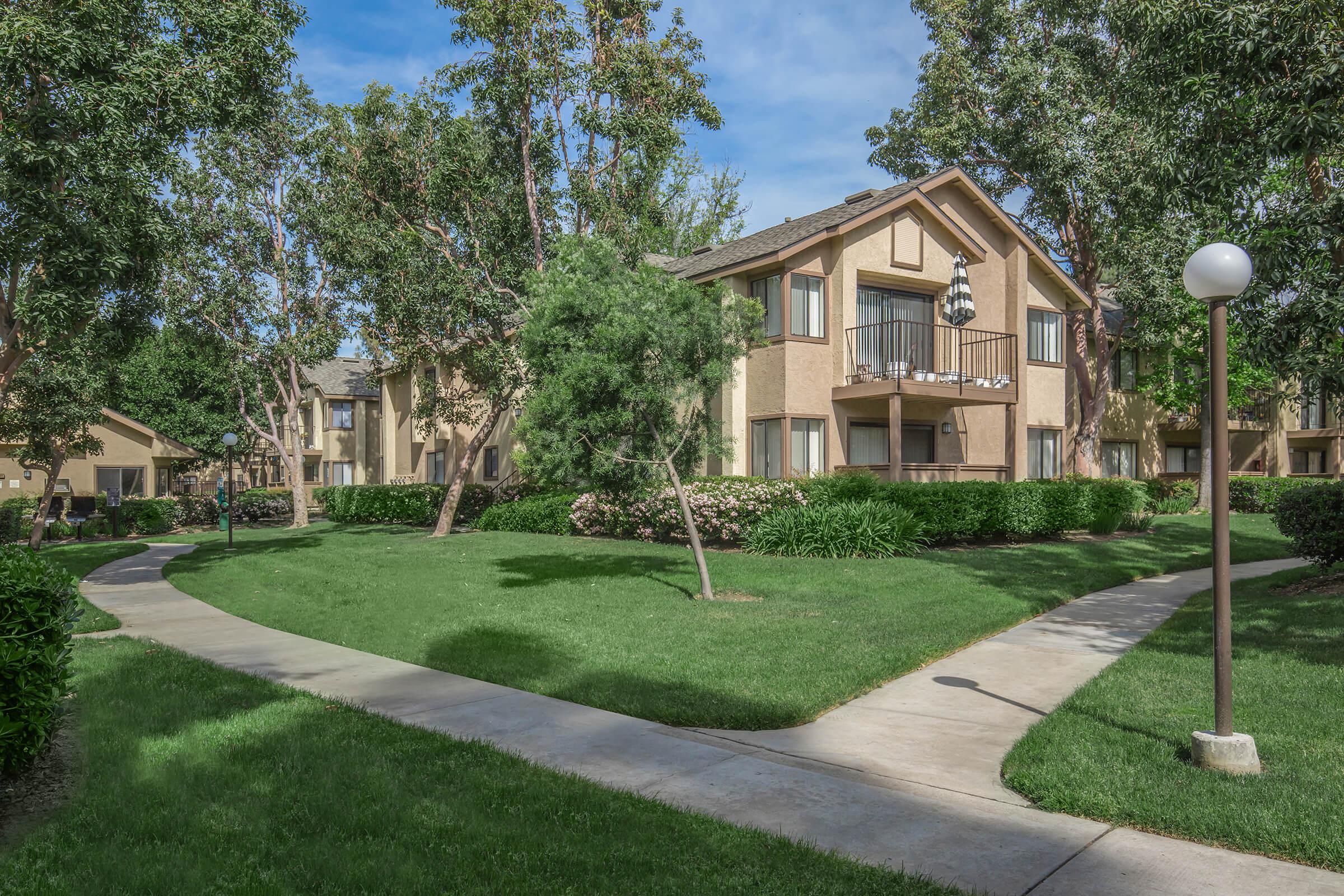 Community buildings with green grass