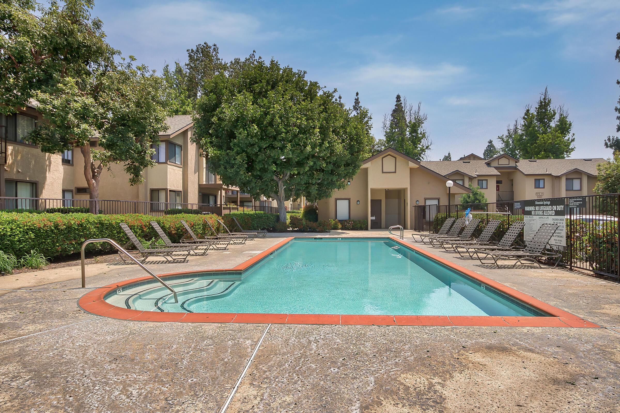 Mountain Springs Apartment Homes community pool and community buildings