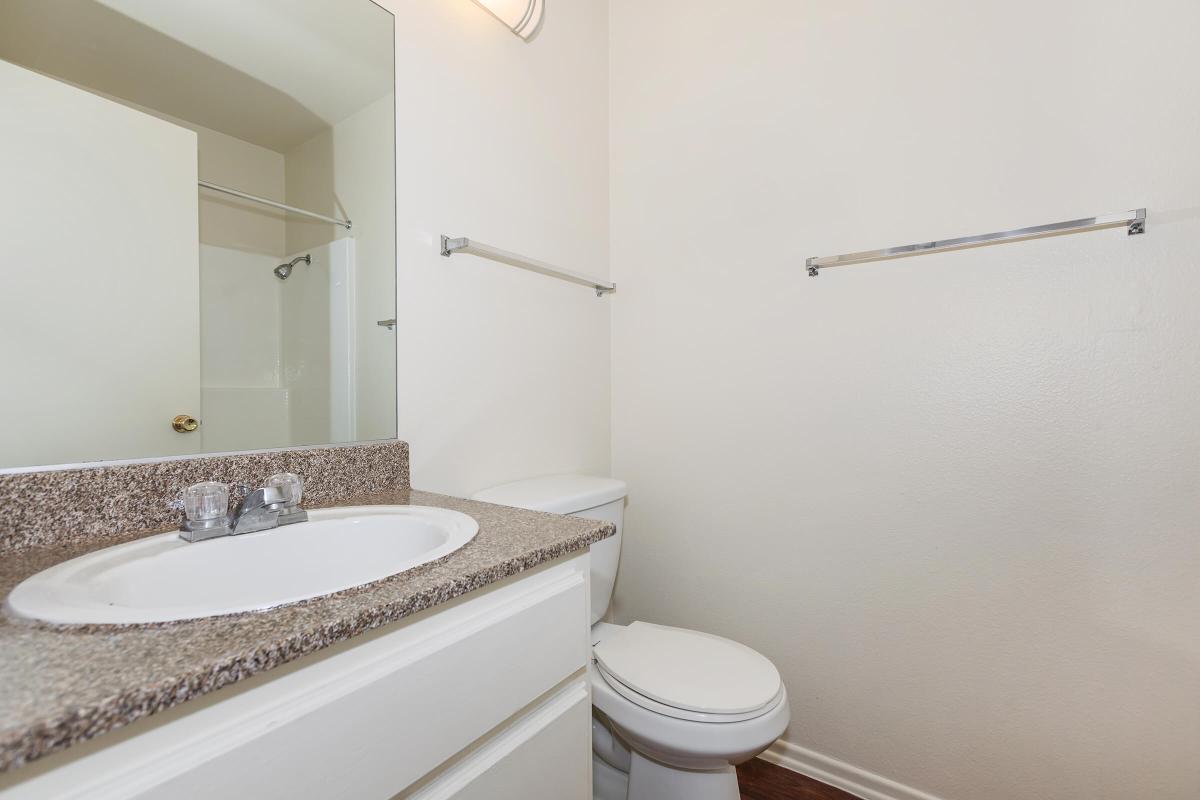 Bathroom with white cabinets