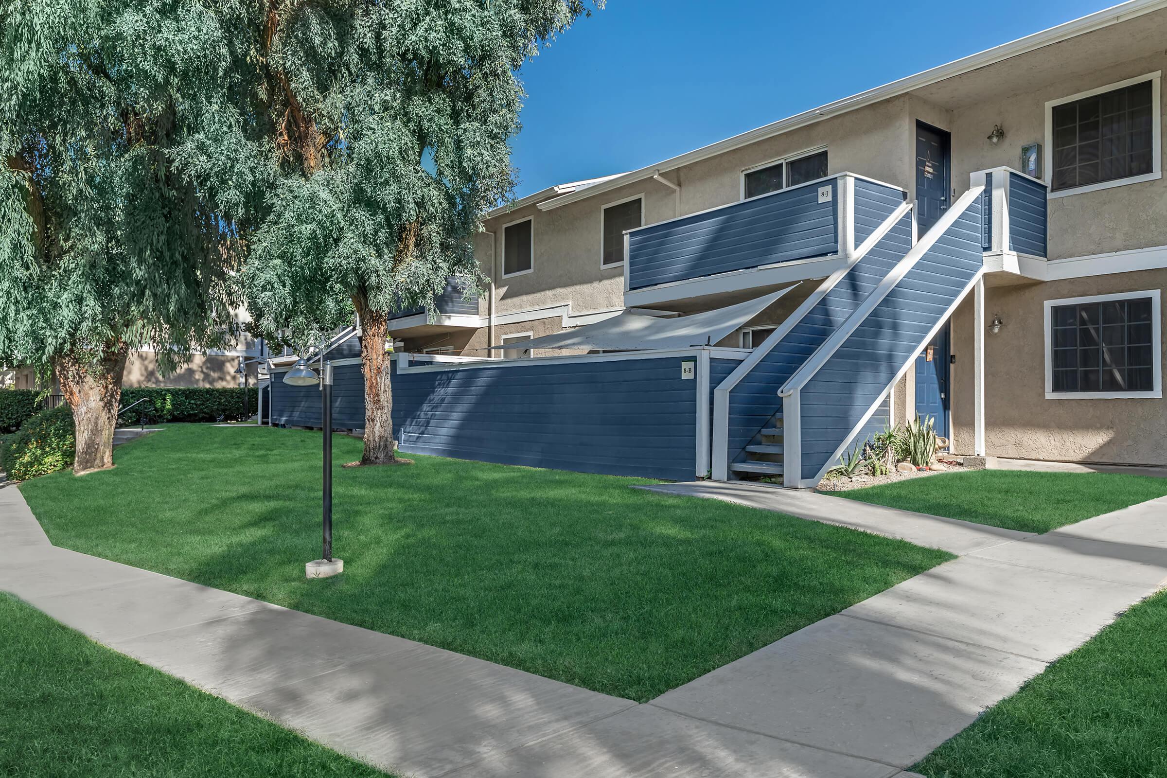 a large lawn in front of a house